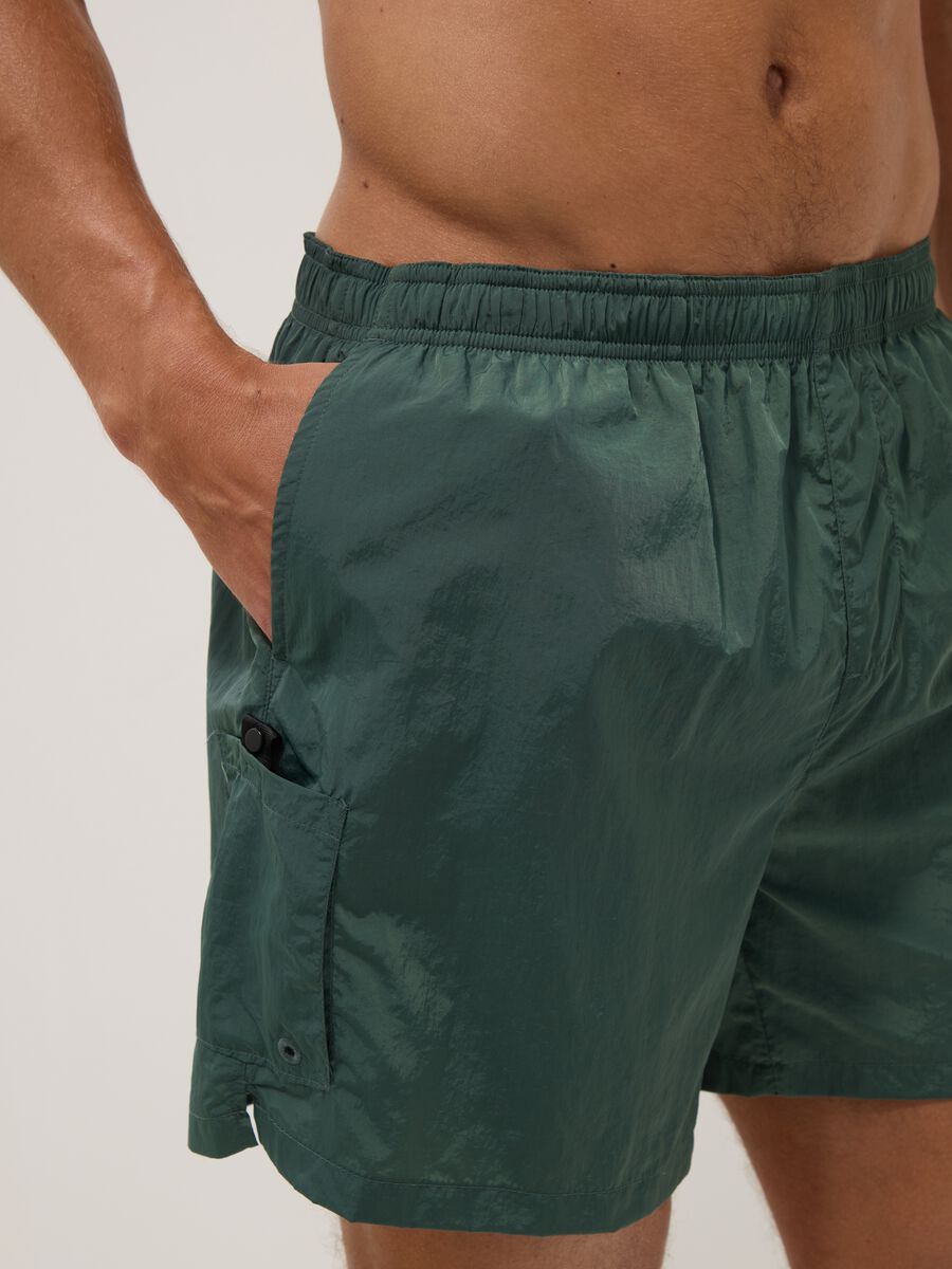 Green swim shorts with elasticated waistband_3