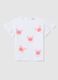 White T-shirt in cotton with print and flounce_0