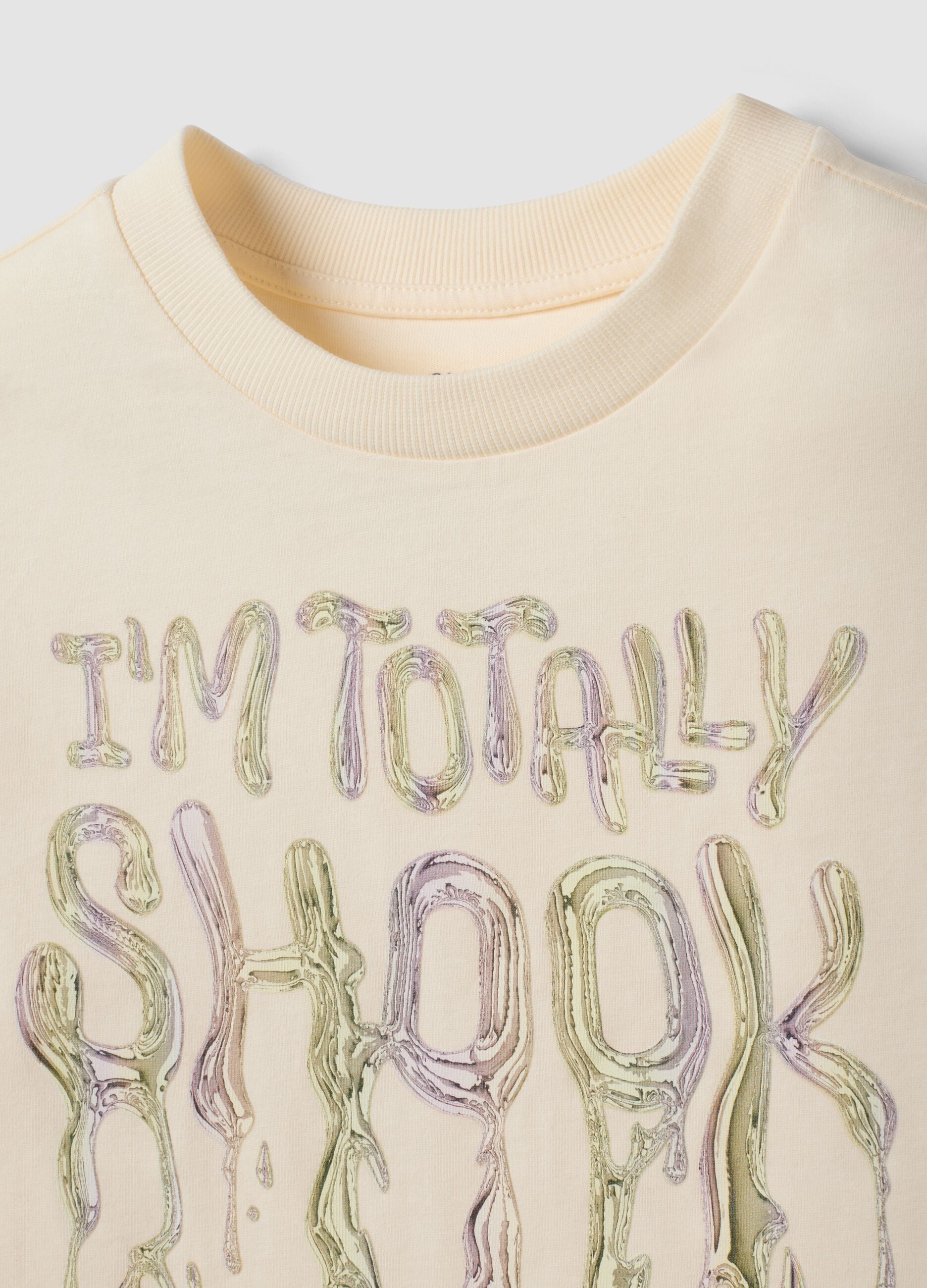 Beige pure cotton T-shirt with ribbed crew neck and front slogan