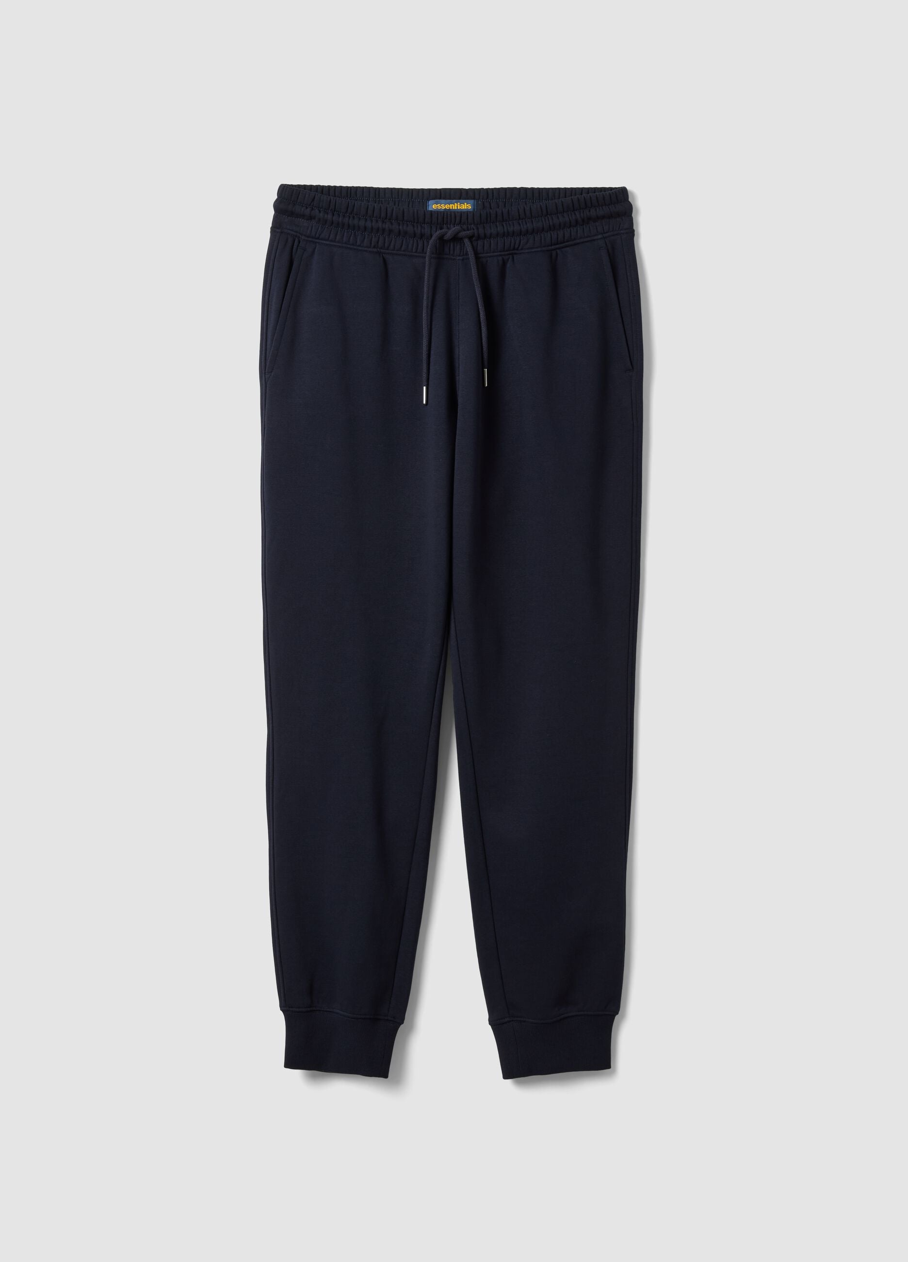 Blue cotton-blend joggers with cuffed hems and drawstring