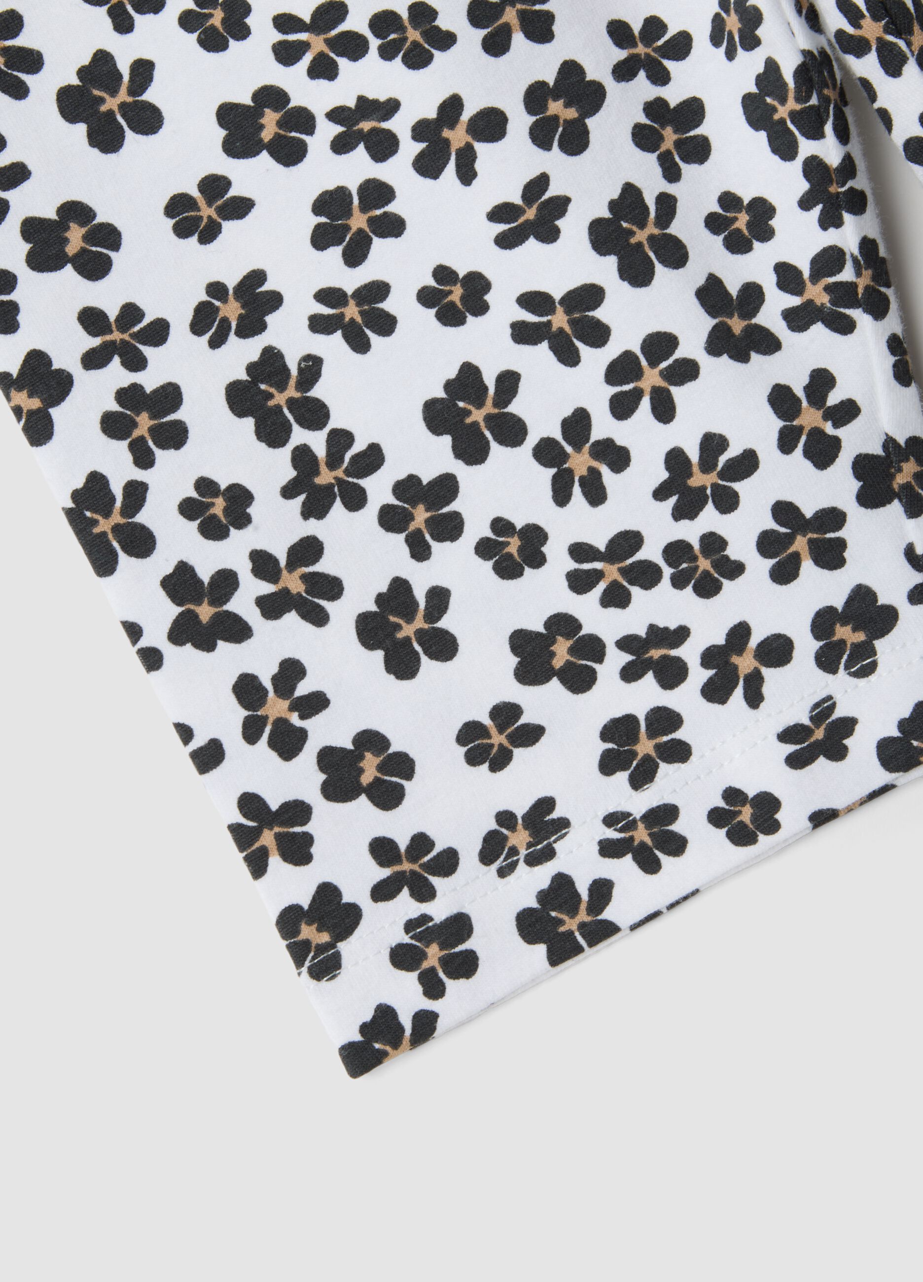 White organic cotton shorts with floral print