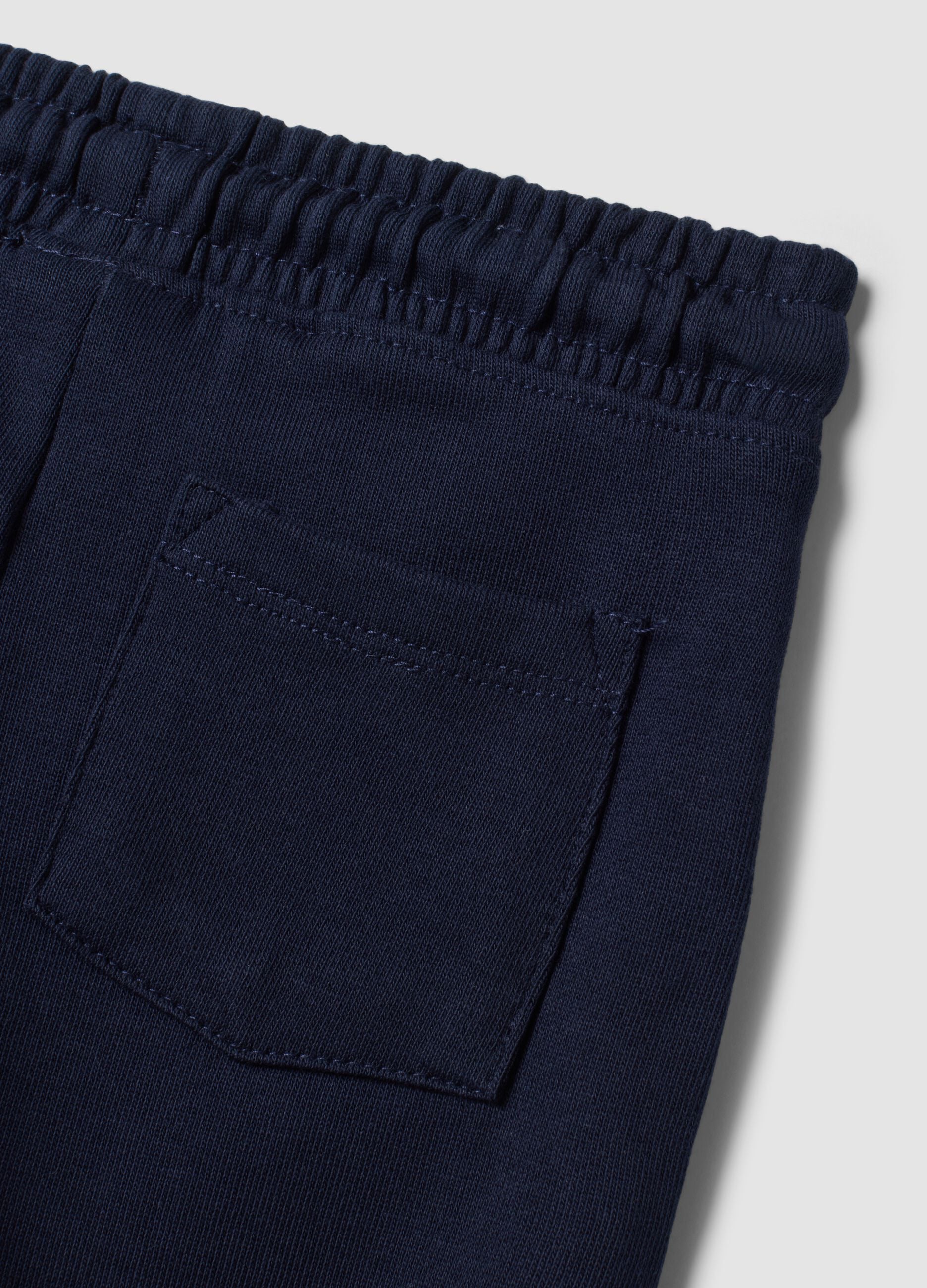 Blue pure cotton jogger trousers with puppy print for baby boy