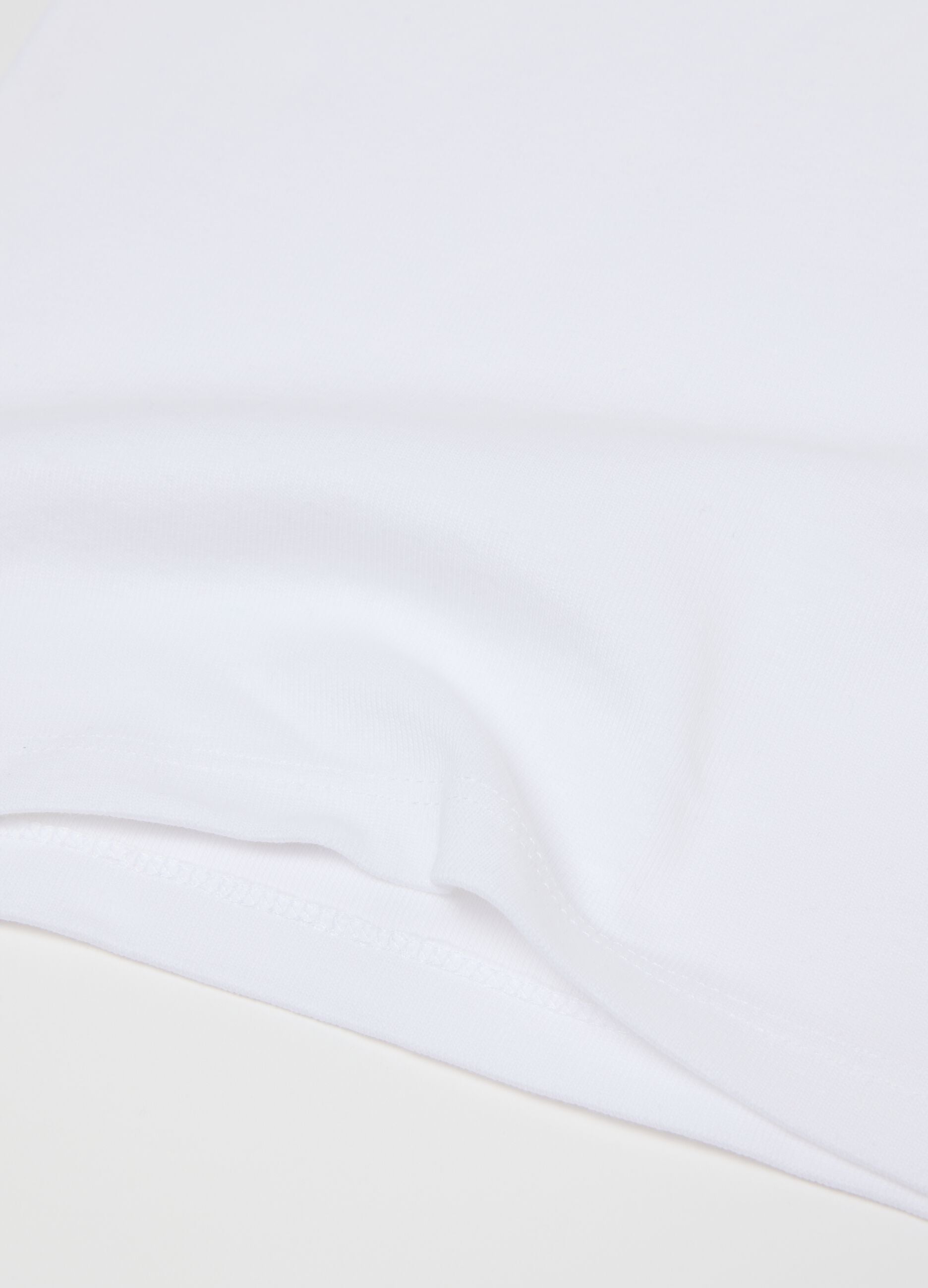 Twin pack of white cotton vests for girls in regular fit
