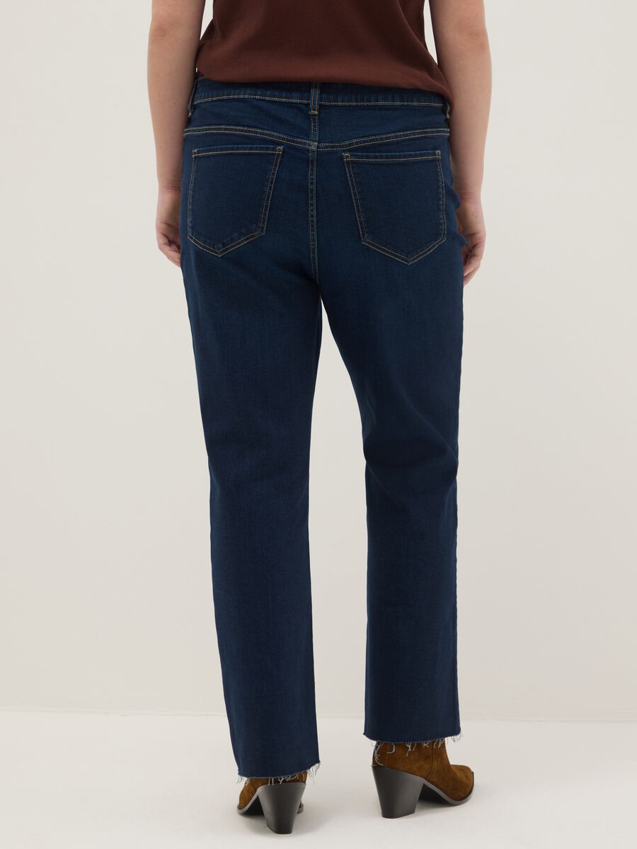 Jeans blu elasticizzati con taglio flare_2