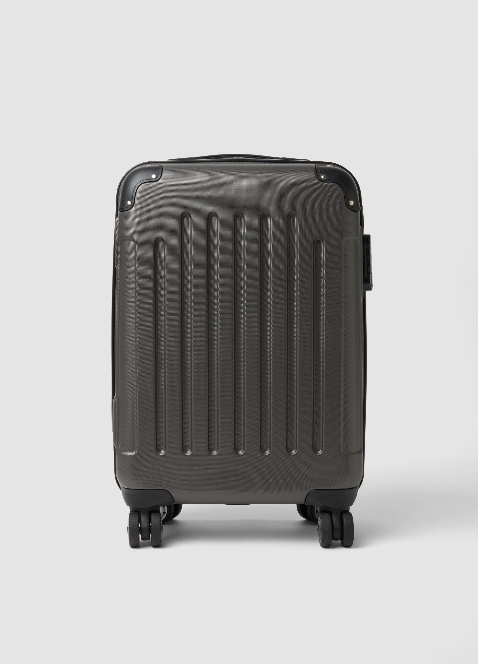 Grey hard-shell travel trolley suitcase with wheels
