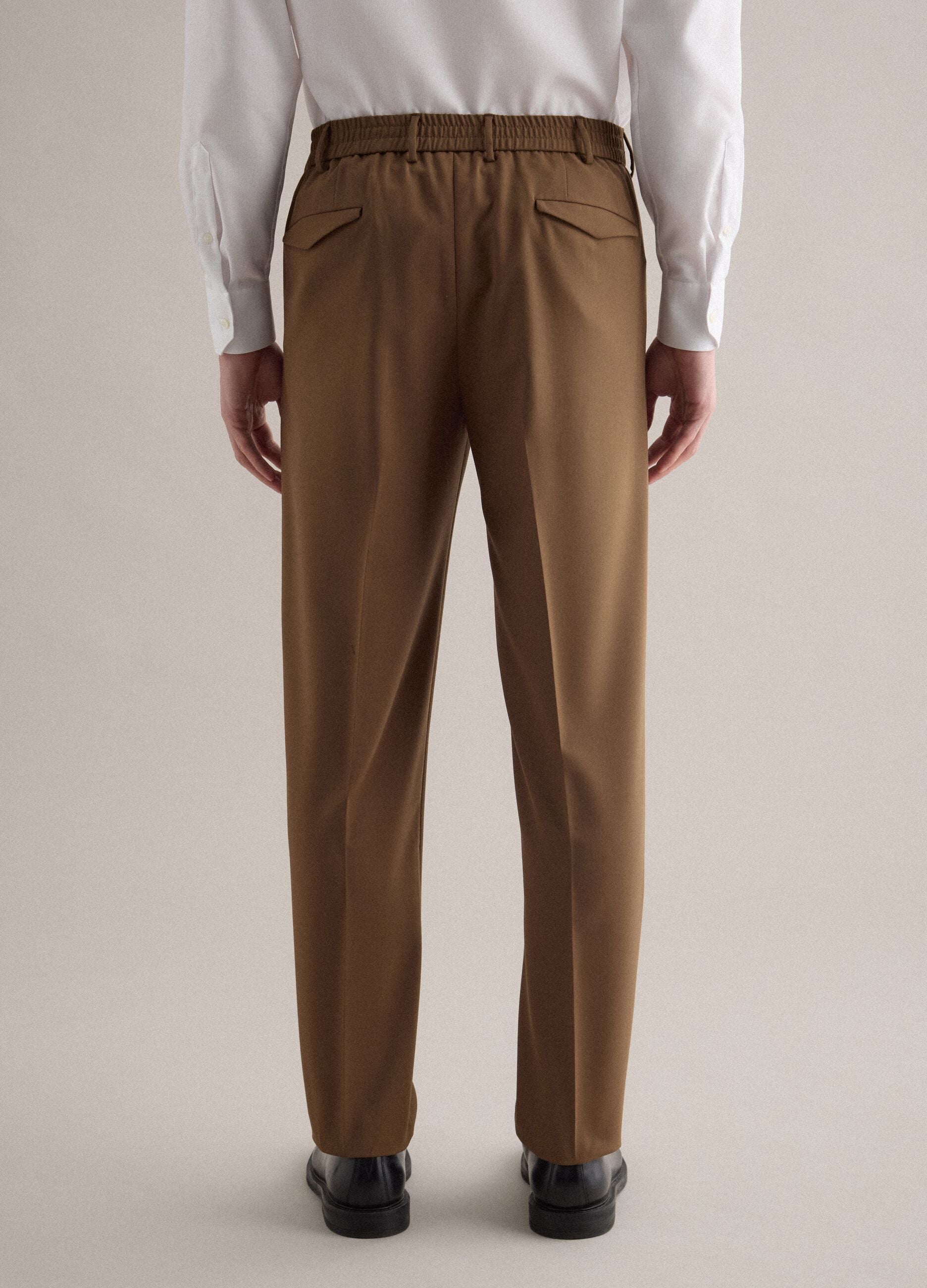 Brown slim fit elegant trousers with elastic waistband