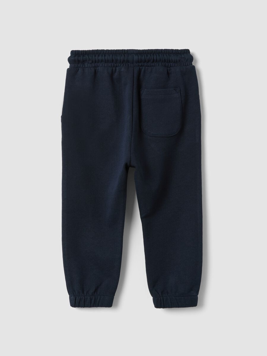 Blue jogger trousers in pure organic cotton with drawstring for baby boys_1