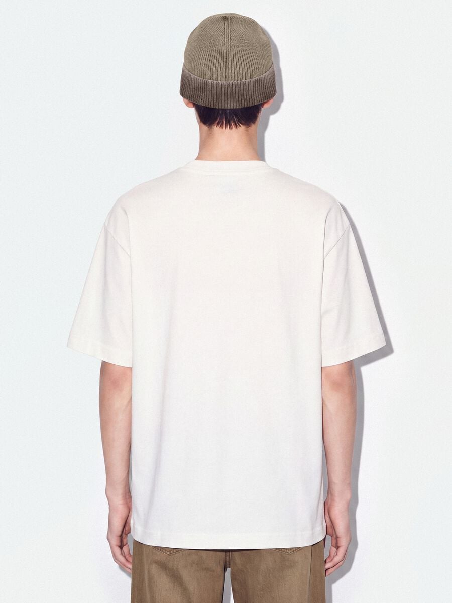 T-shirt bianca in puro cotone girocollo con taschino boxy fit_3
