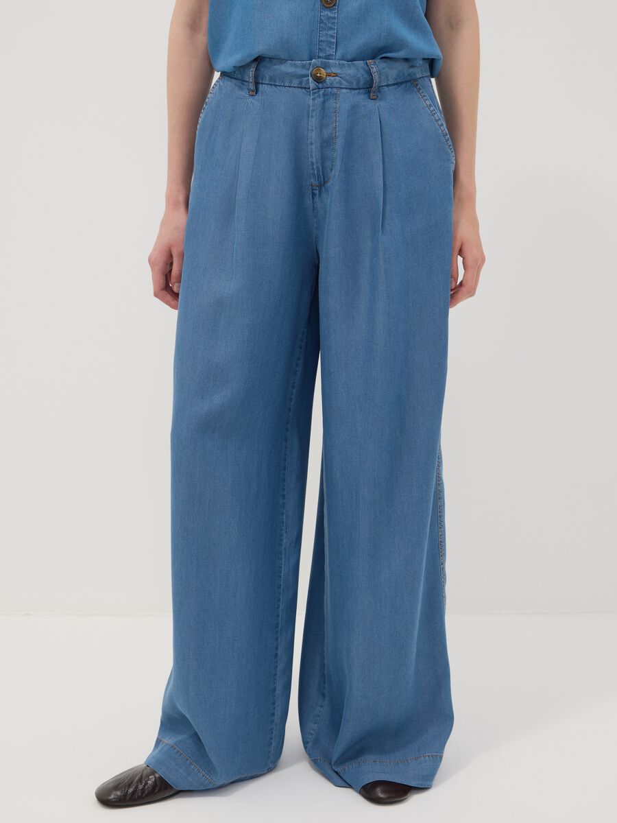 Light blue wide-leg denim trousers in pure lyocell_1