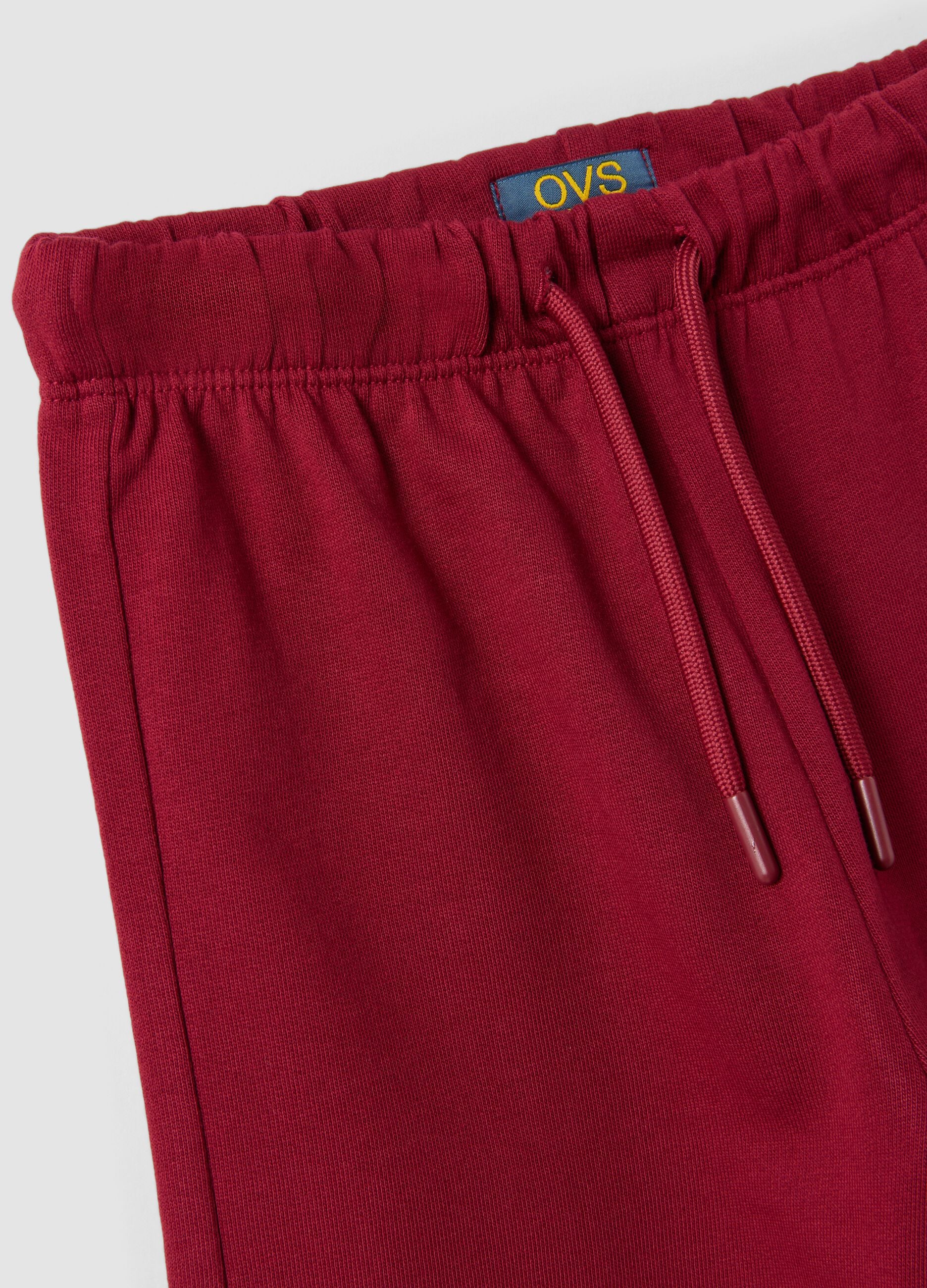 Red pure cotton trousers with elasticated waist and bow for girls