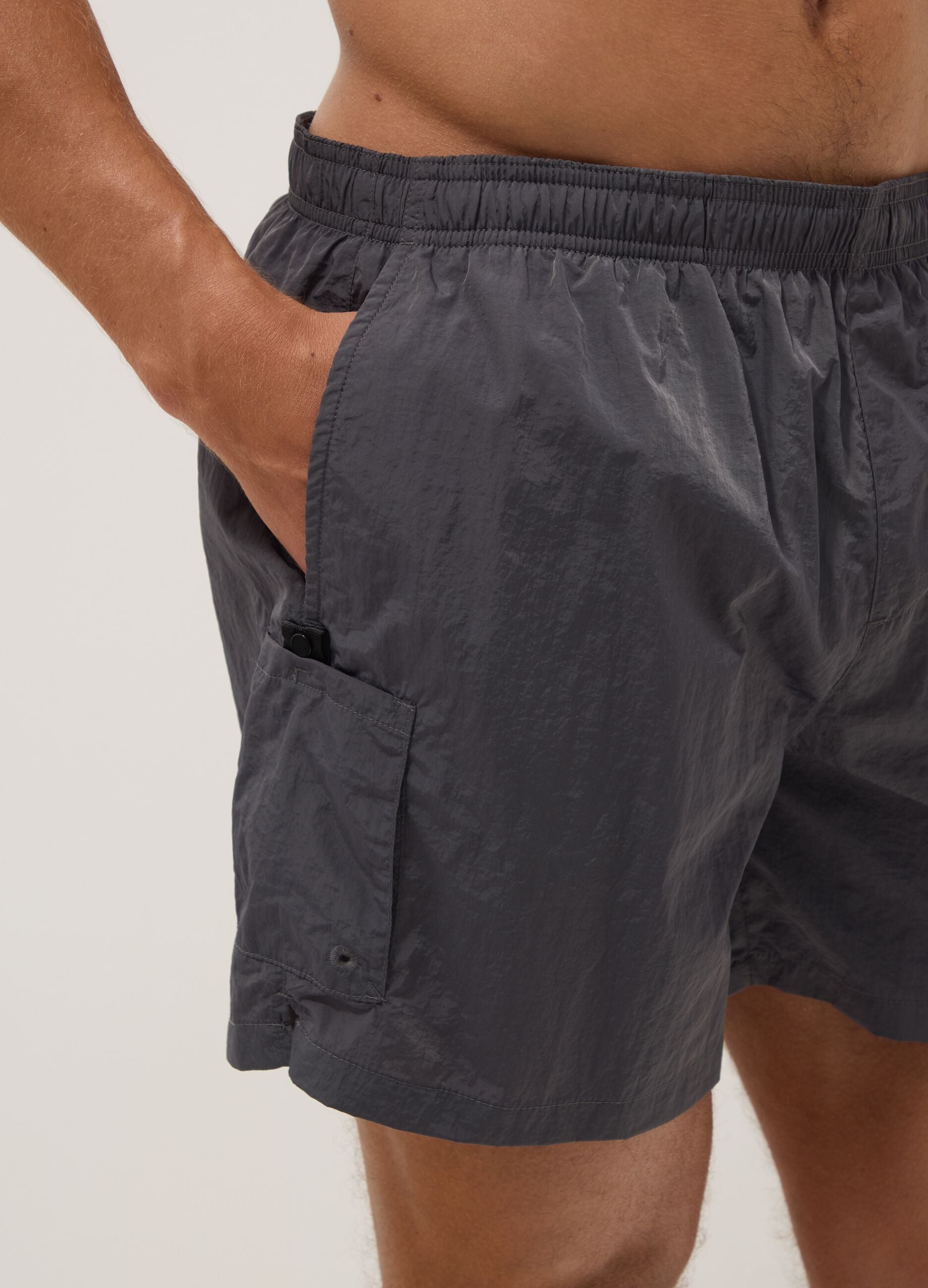 Grey swim shorts with elasticated waistband