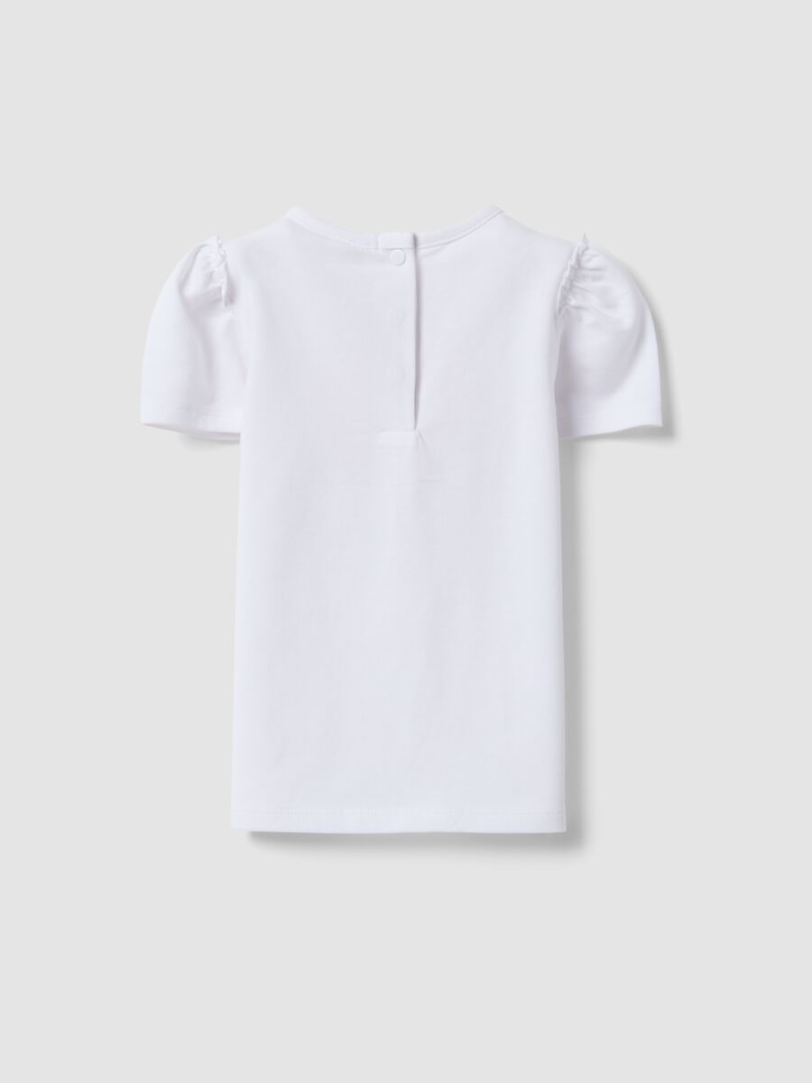 T-shirt in cotone elasticizzato bianca da bimba regular fit con fiore_1