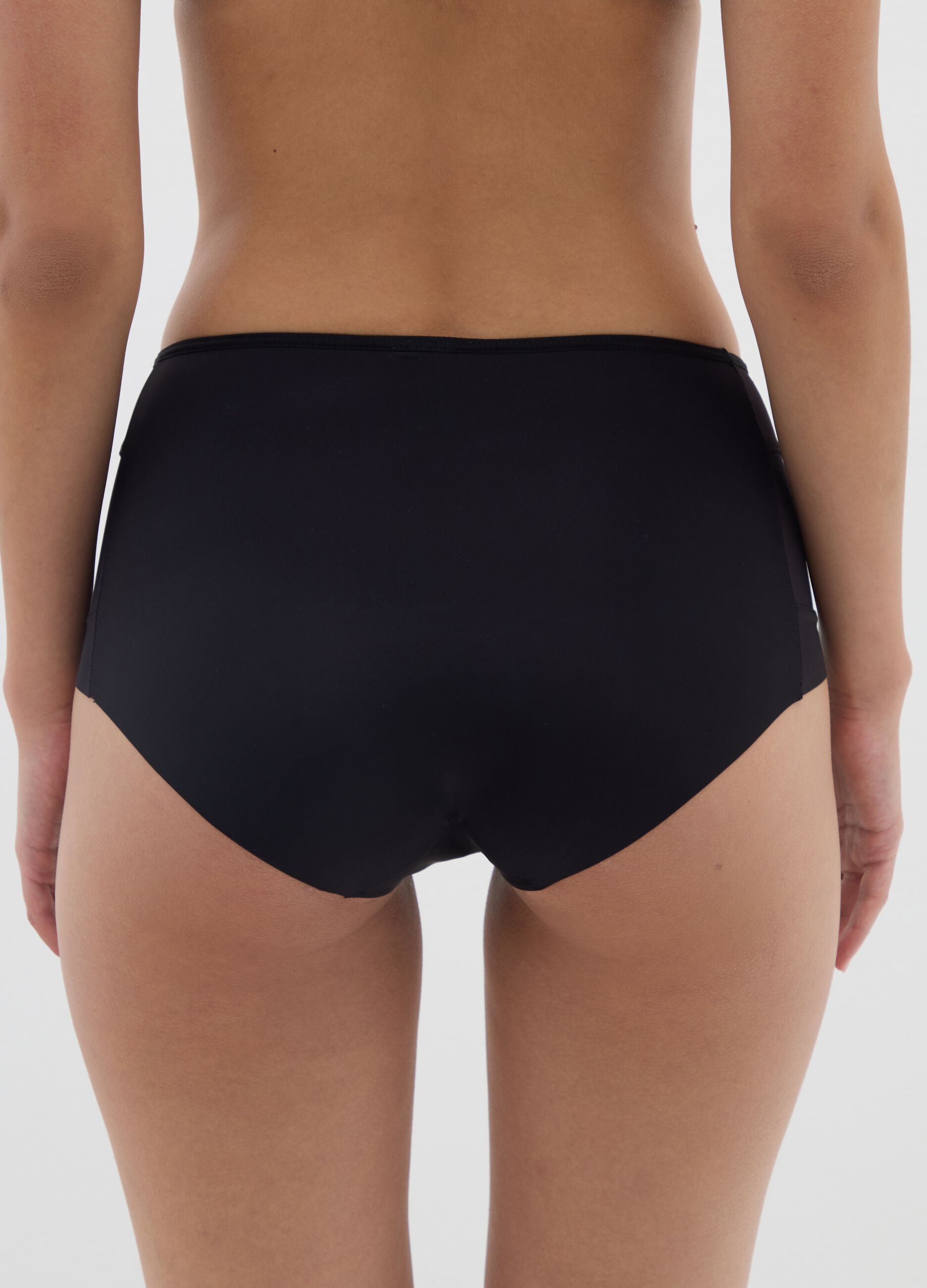 High-waisted black fabric briefs