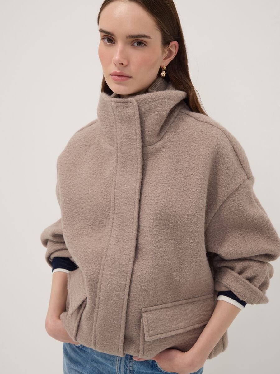 Beige regular-fit jacket with high neck and patch pockets_1