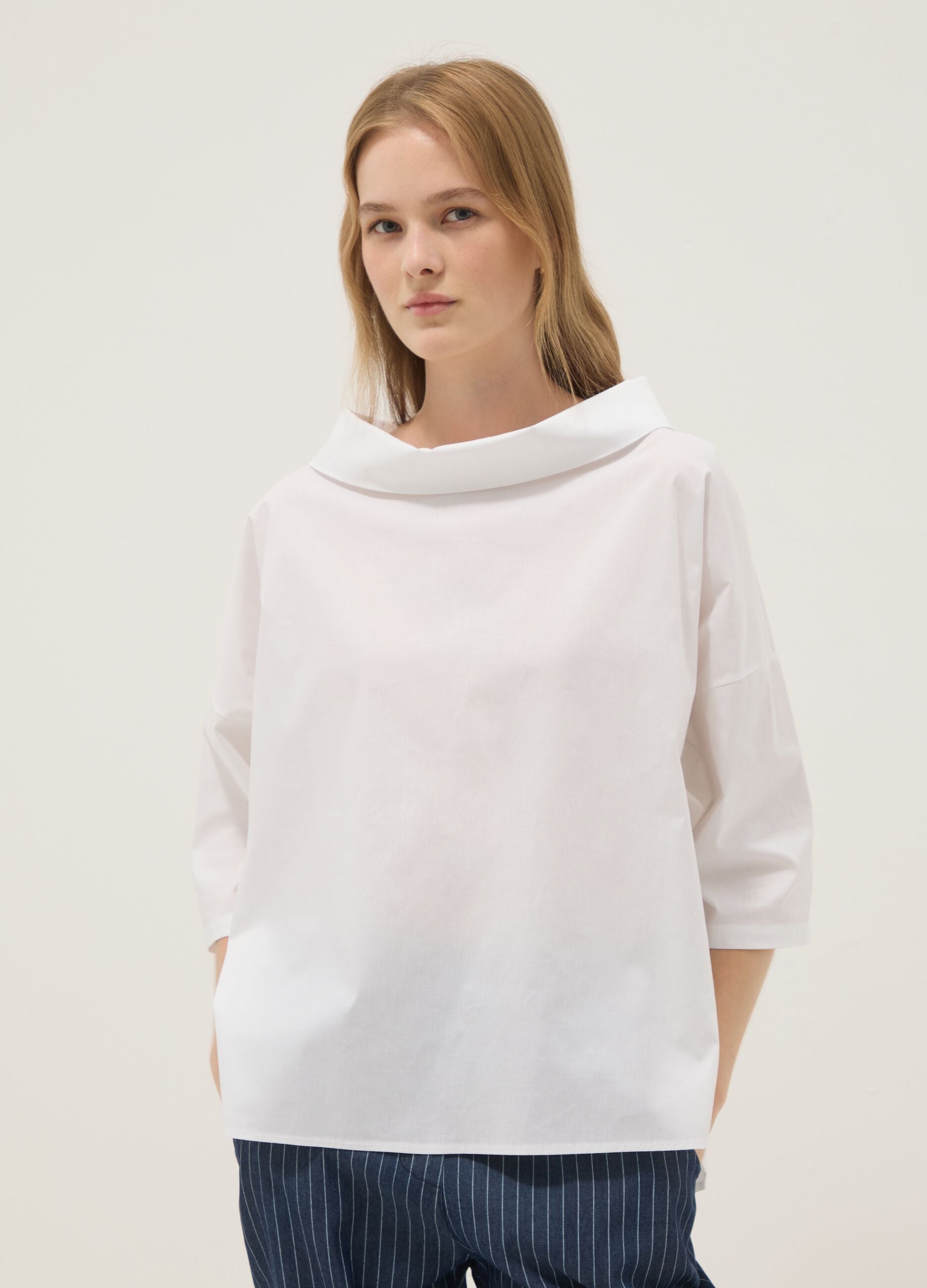 White stretch-cotton top with soft funnel neck
