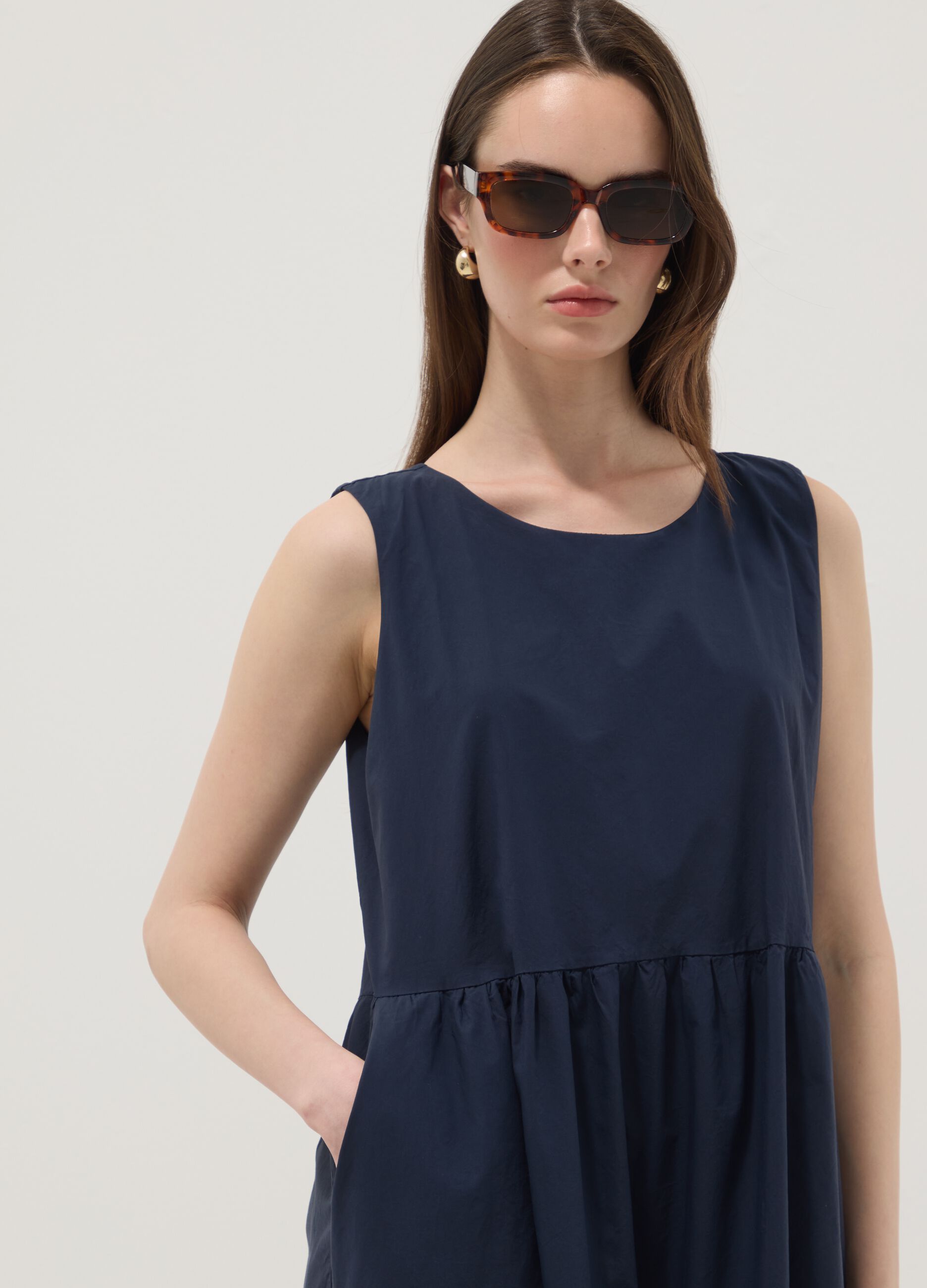 Blue sleeveless pure cotton dress with tiered skirt, regular fit