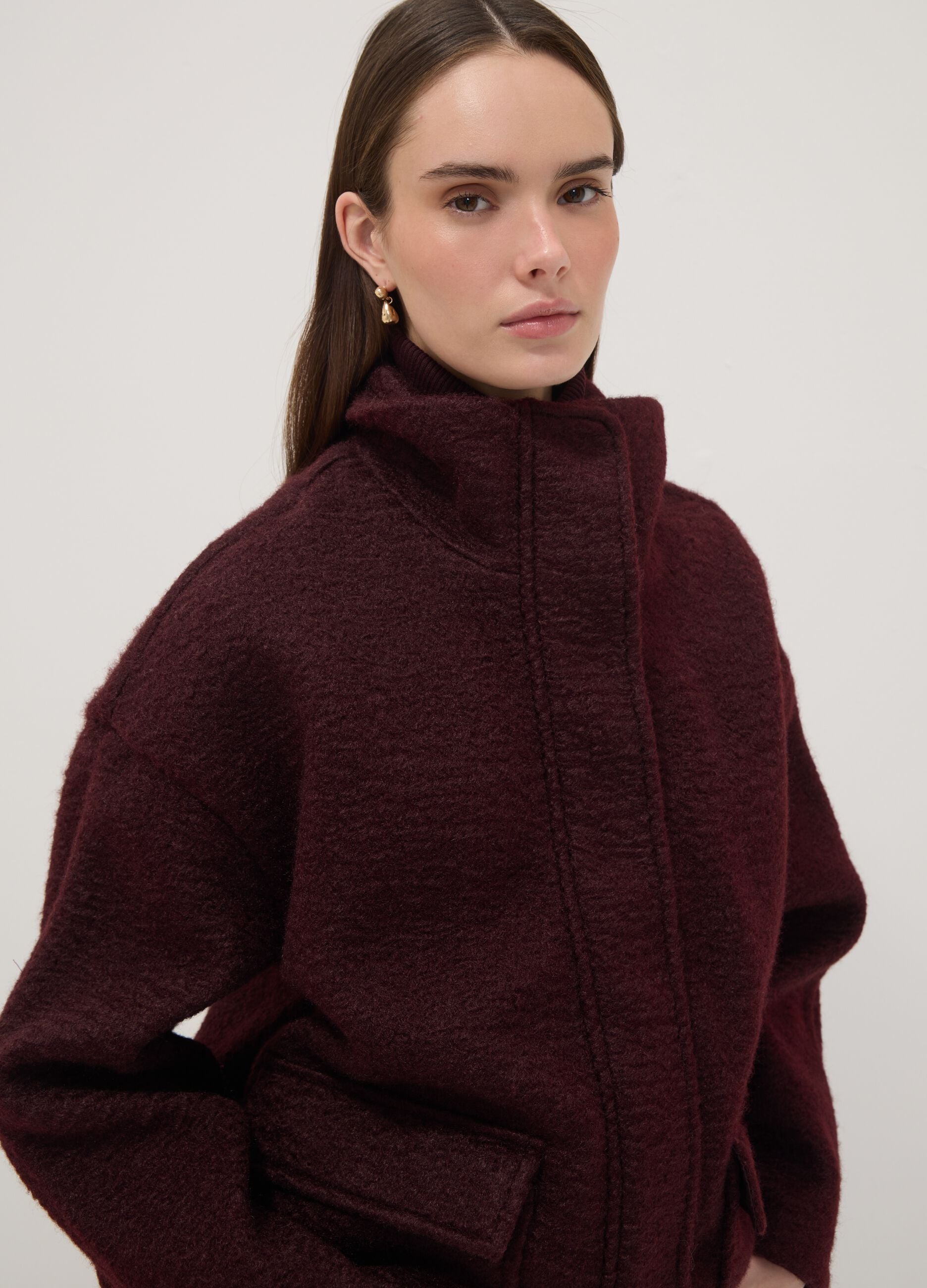 Red jacket with zip and press studs