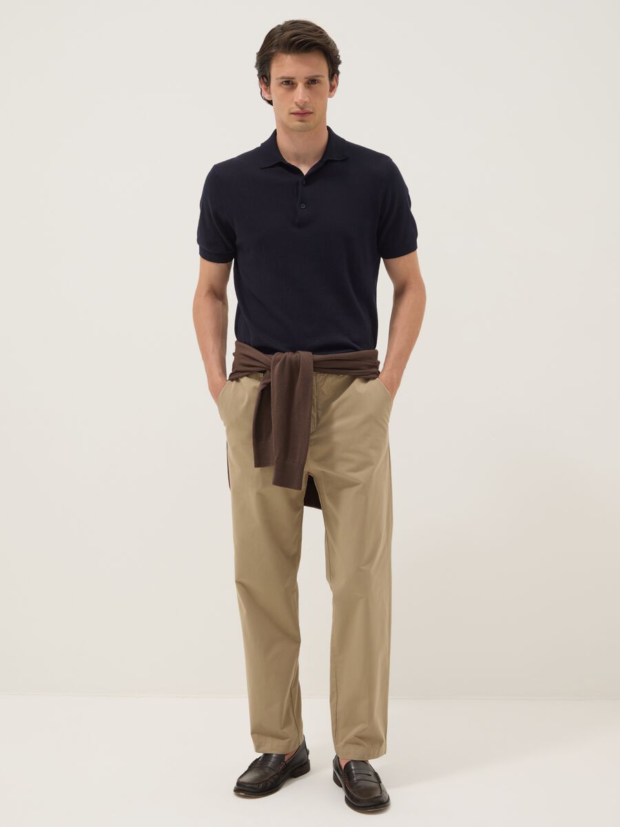 Pantaloni chino beige in puro cotone carrot fit_1