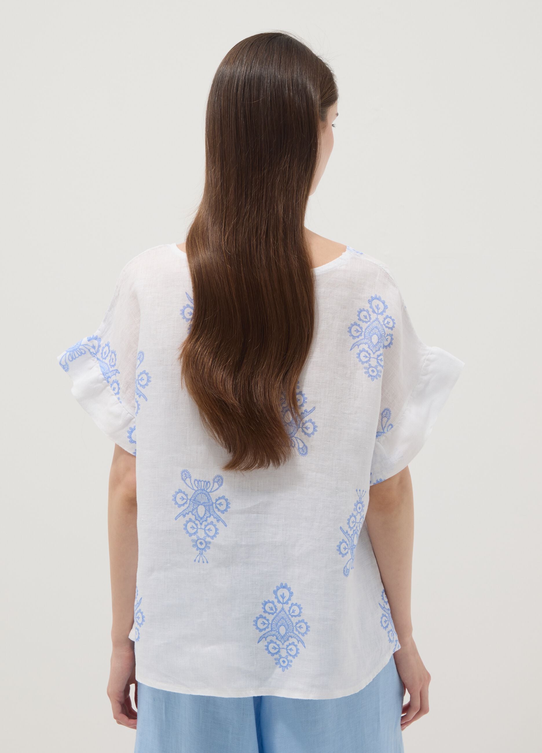White pure linen blouse with embroidery and ruffle sleeves, regular fit