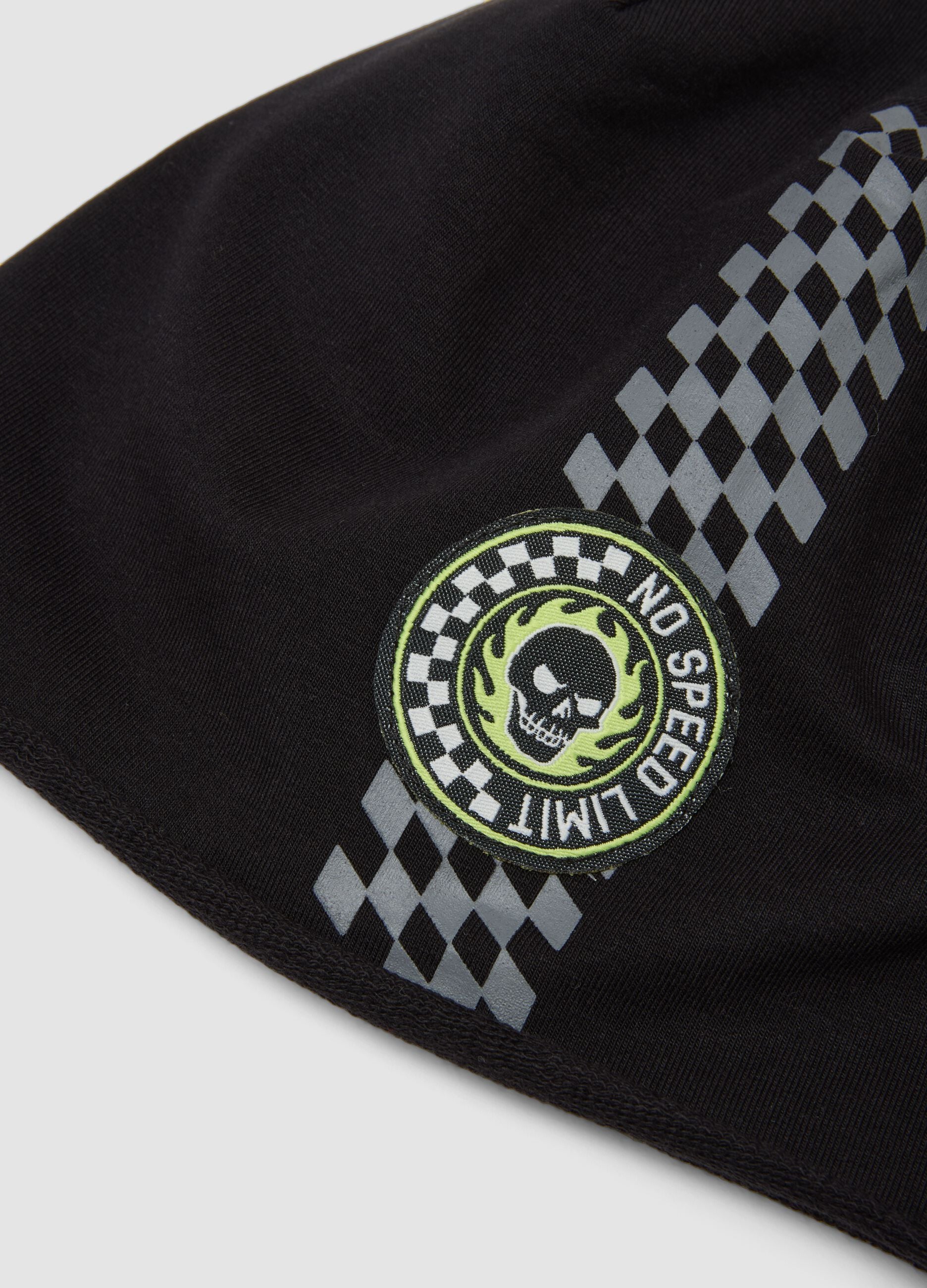 Black stretch organic cotton hat with chequered graphic print