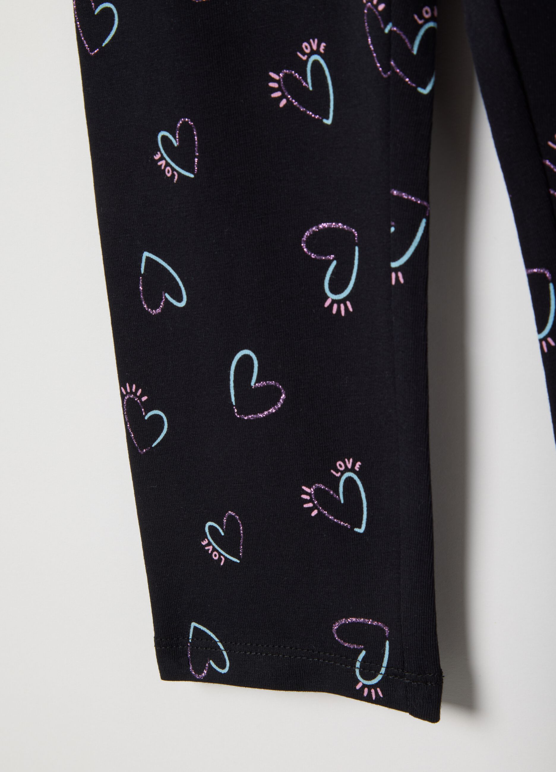 Girls' black stretch cotton skinny fit leggings with hearts