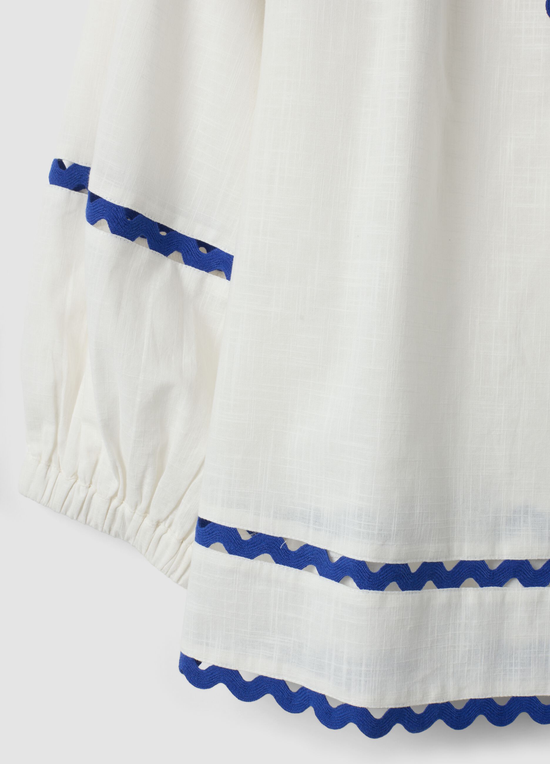 White pure cotton blouse with blue piping, regular fit