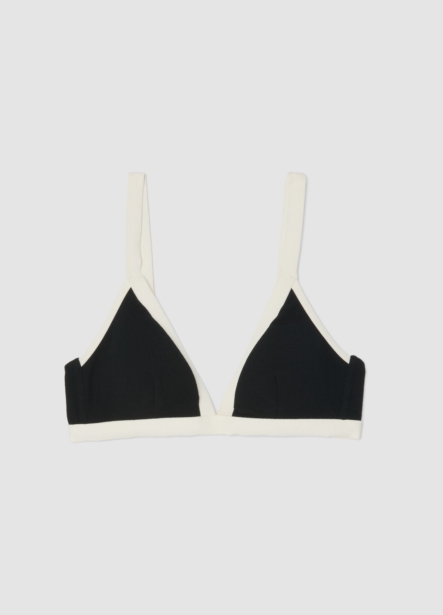 Black stretch-fabric bikini top with white trim and straps