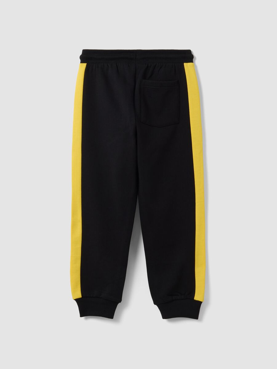 Black 100% cotton kids&rsquo; tracksuit bottoms with yellow side stripes_1