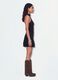 Black stretch dress with high neck and ruffle hem_1