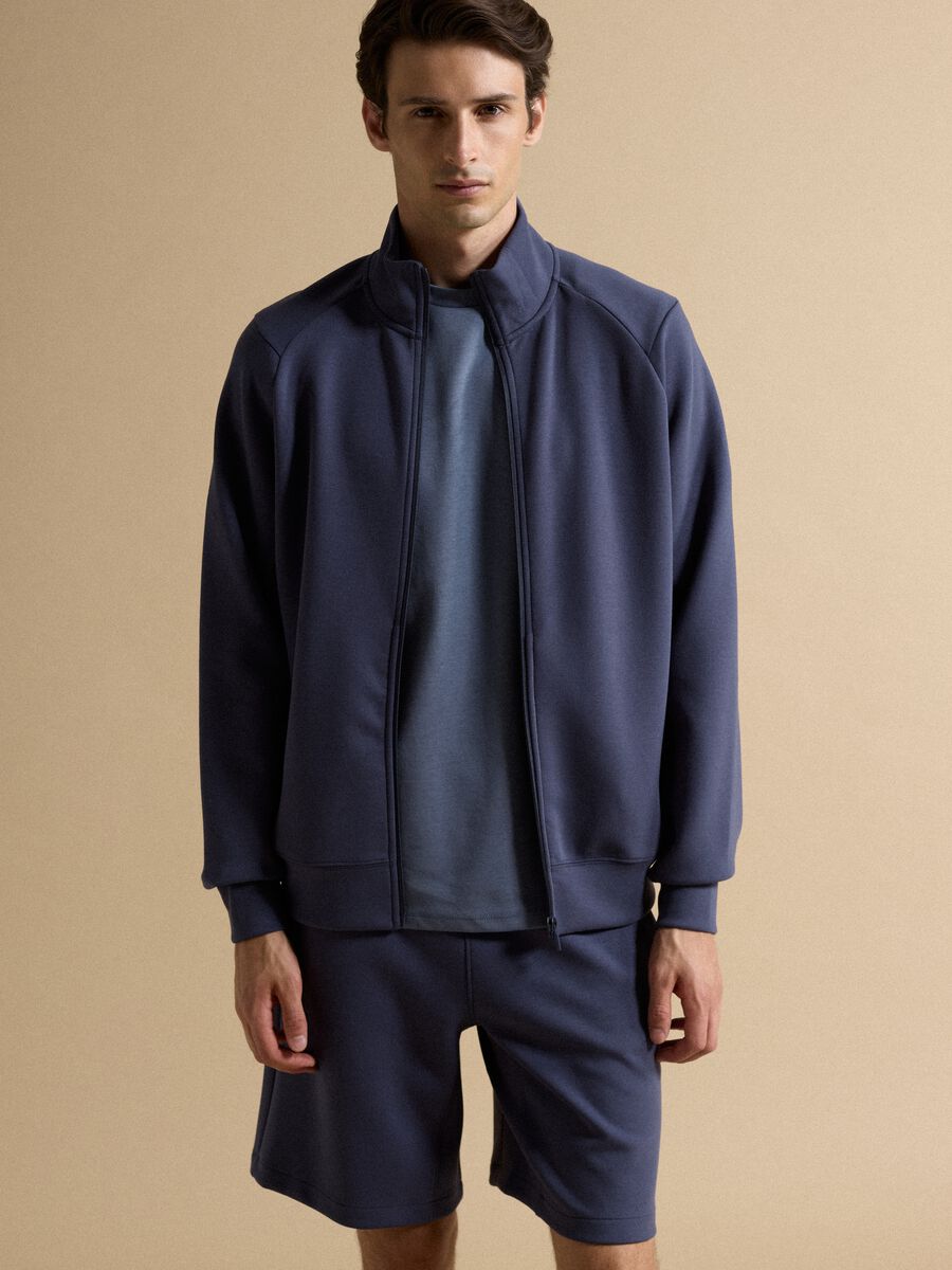 Full-zip blu con colletto in tessuto elasticizzato Easy Dry regular fit_0