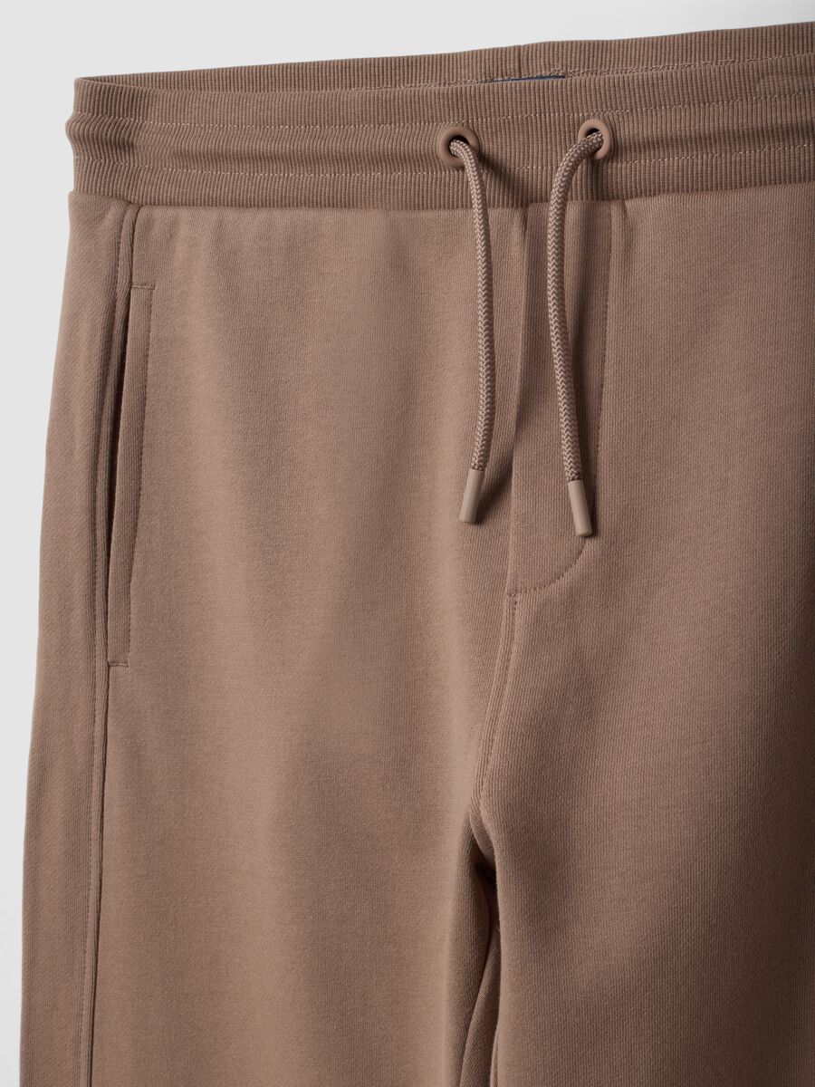 Pantaloni jogger beige in cotone organico_5