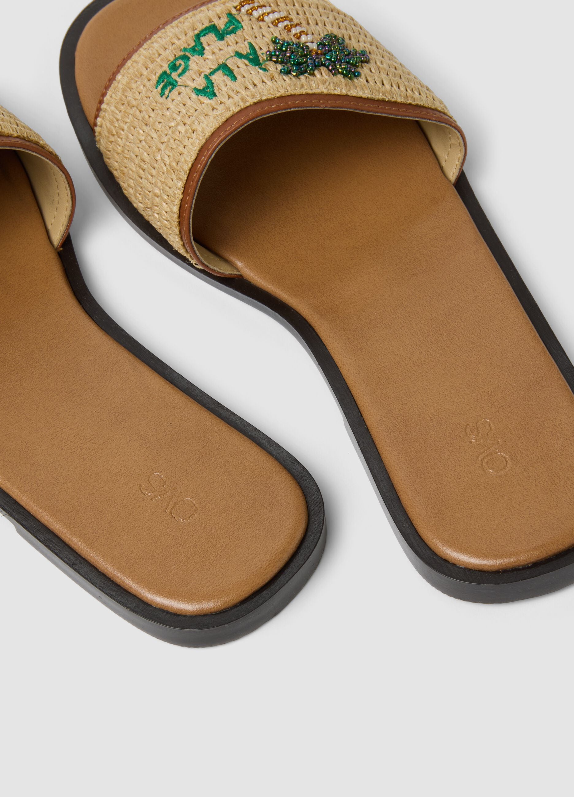 Beige flat sandals with braided embroidered strap