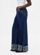 Wide denim trousers with floral turn-up_3