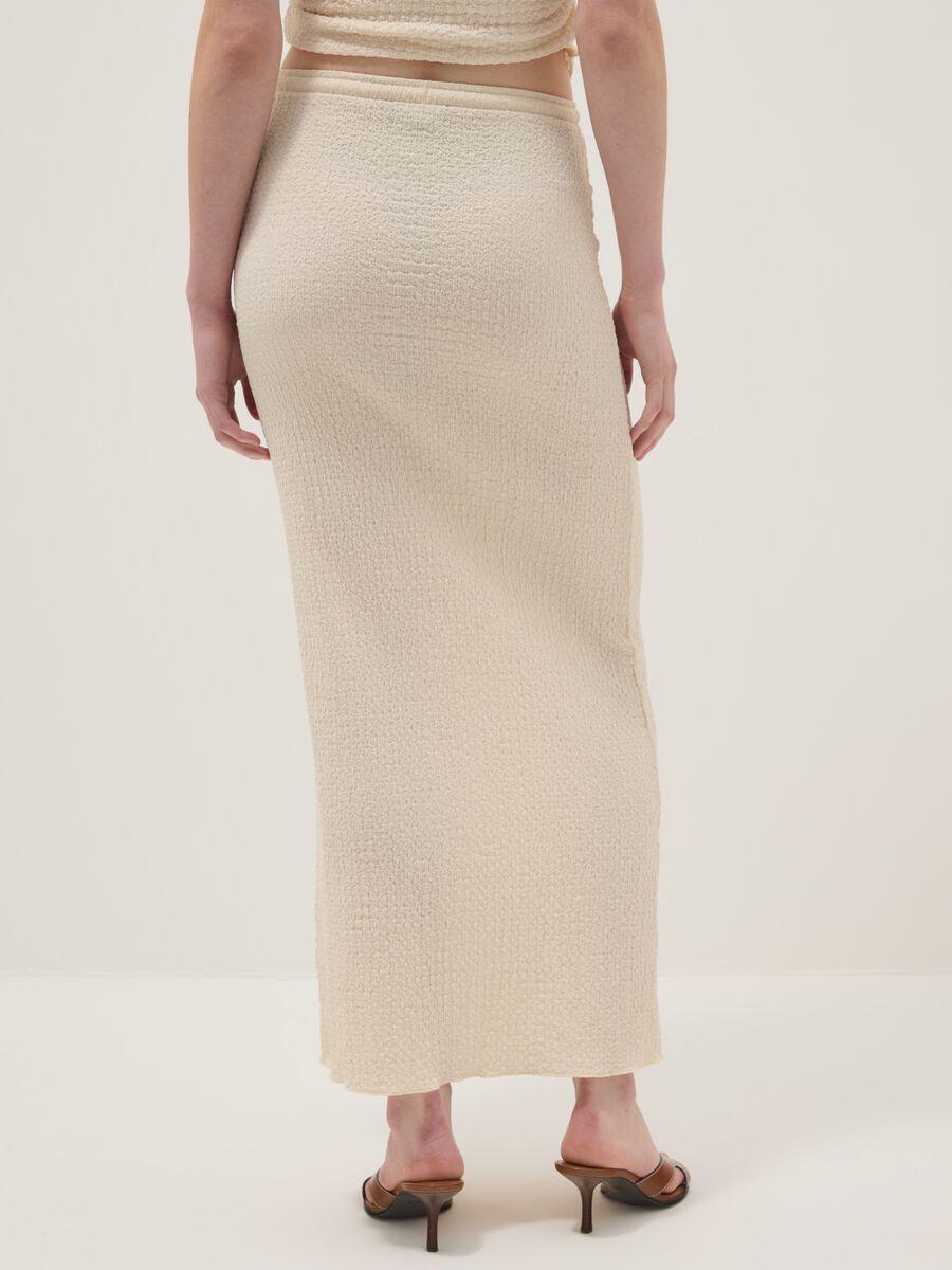Beige long skirt in stretchy textured fabric_2
