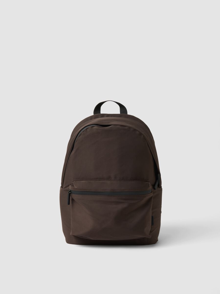 Brown backpack with front pocket and adjustable straps_0