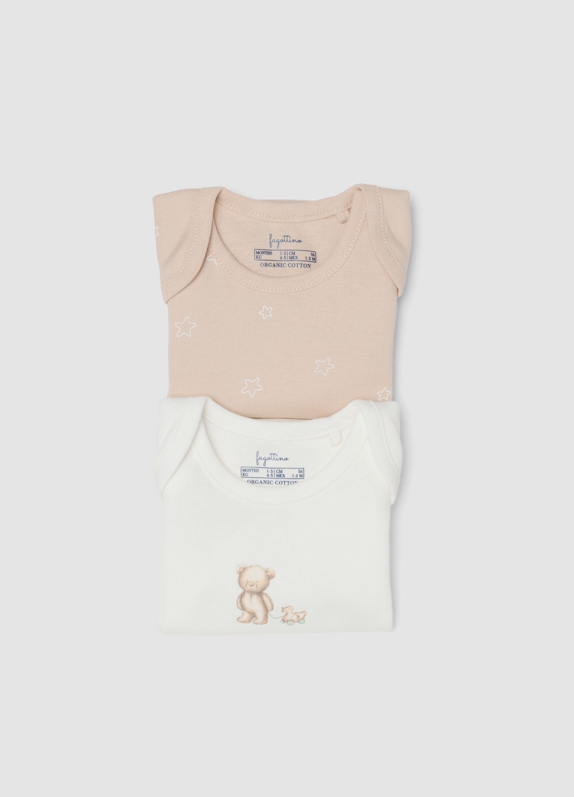 2-pack of white and beige short-sleeve organic cotton baby bodysuits