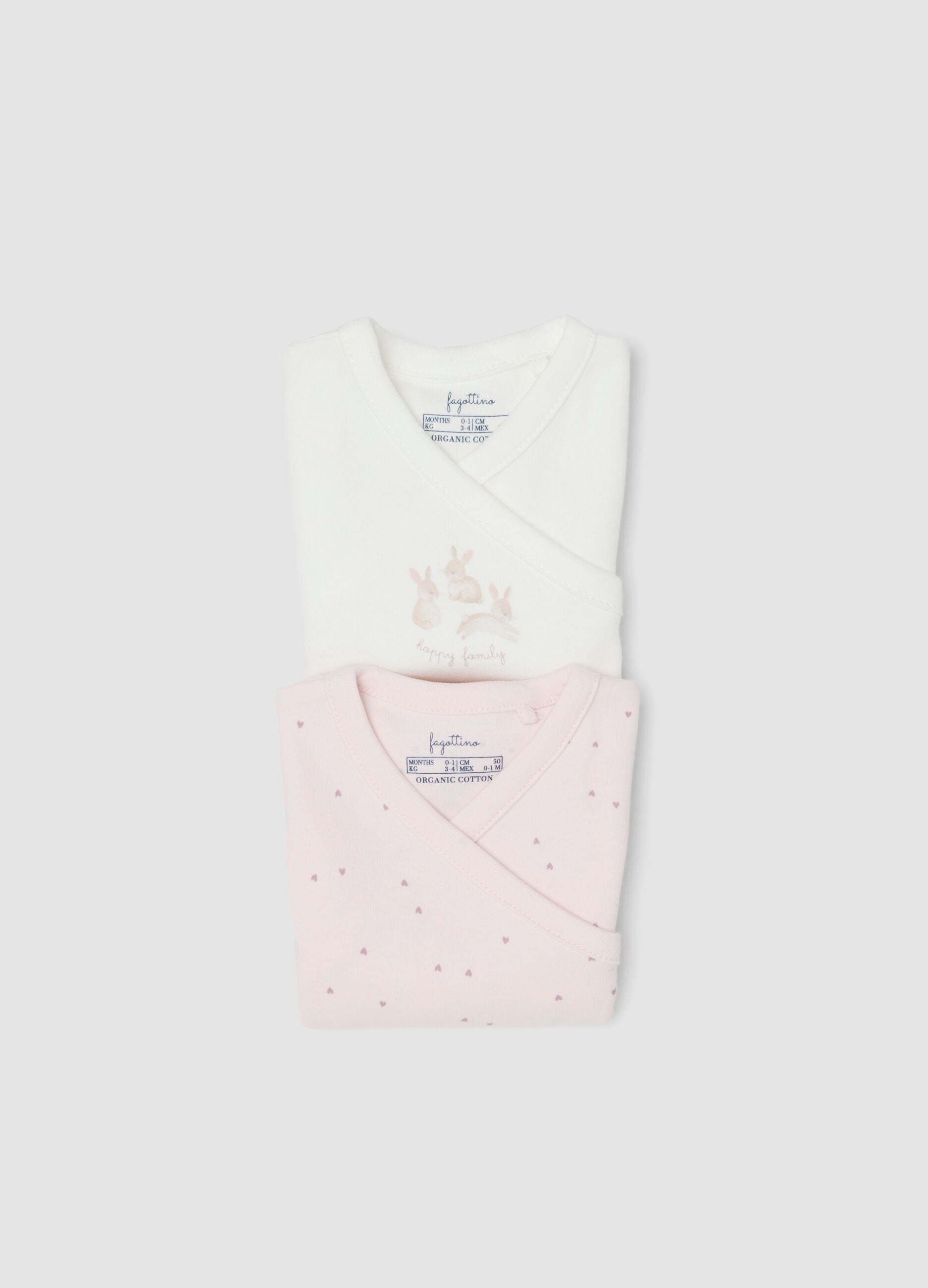 Two-pack of pink and white organic cotton short-sleeve bodysuits for baby girls