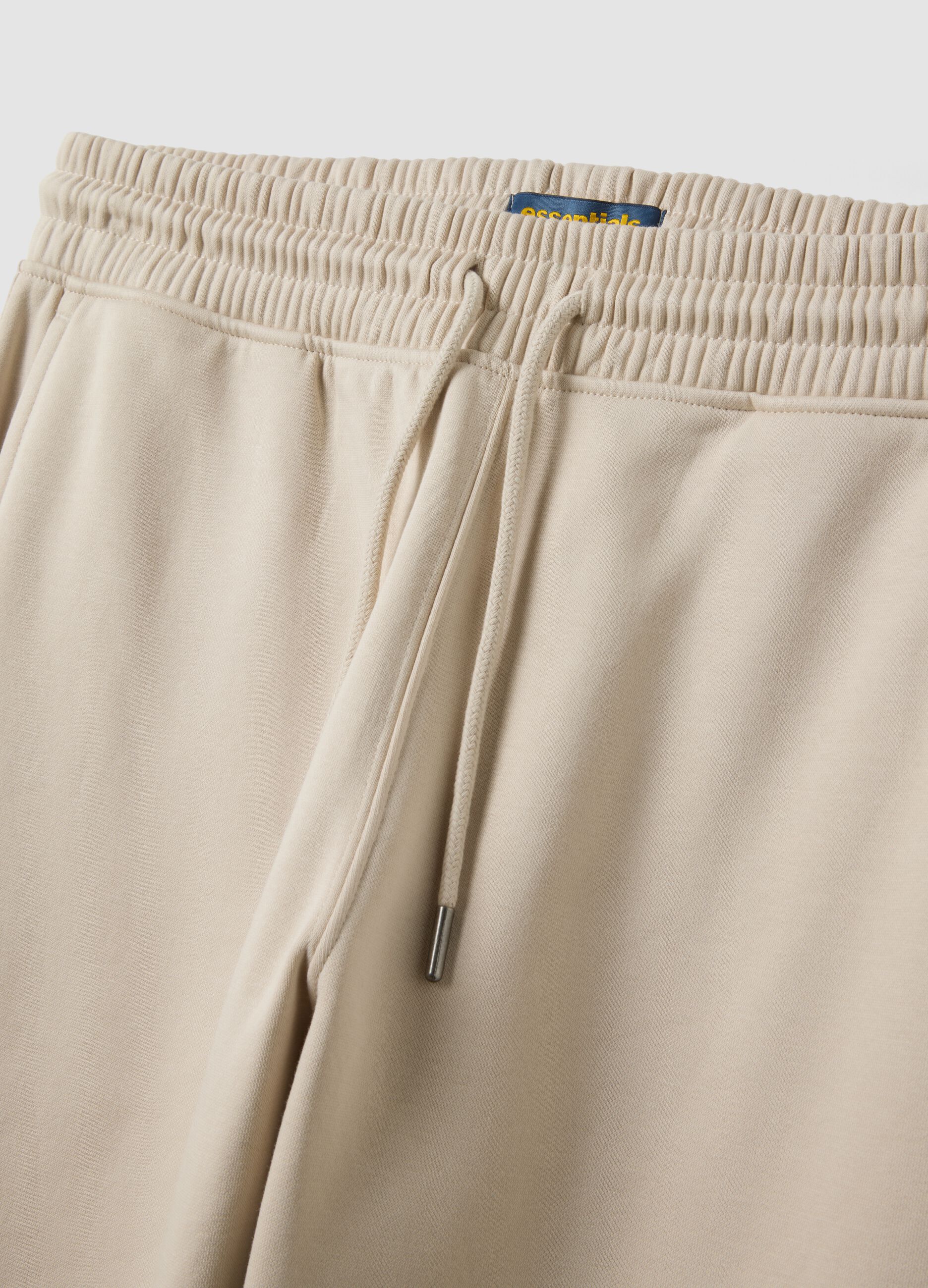 Jogger beige in misto cotone con fondo a polsino e coulisse