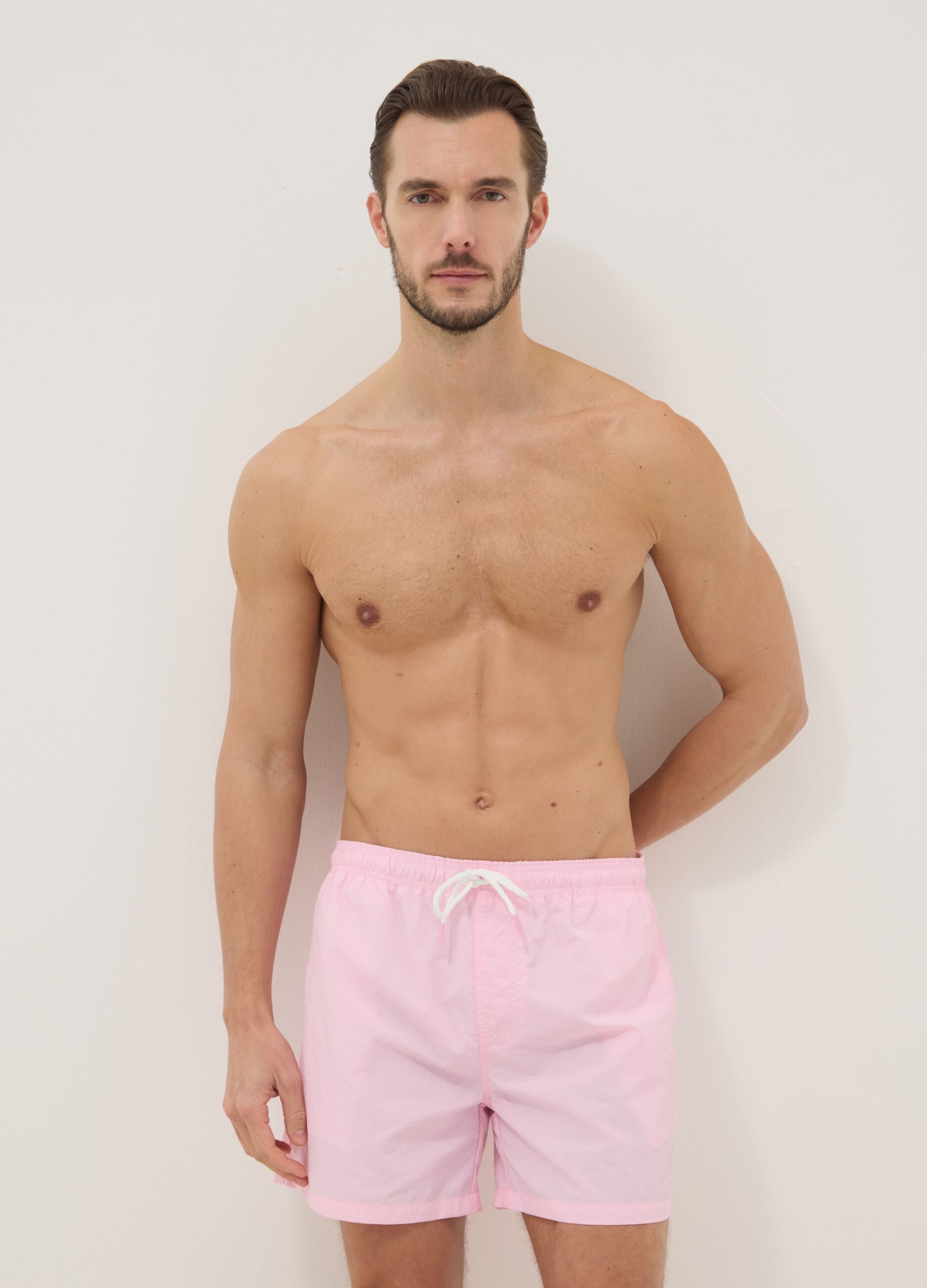 Pink swim shorts with elasticated waist