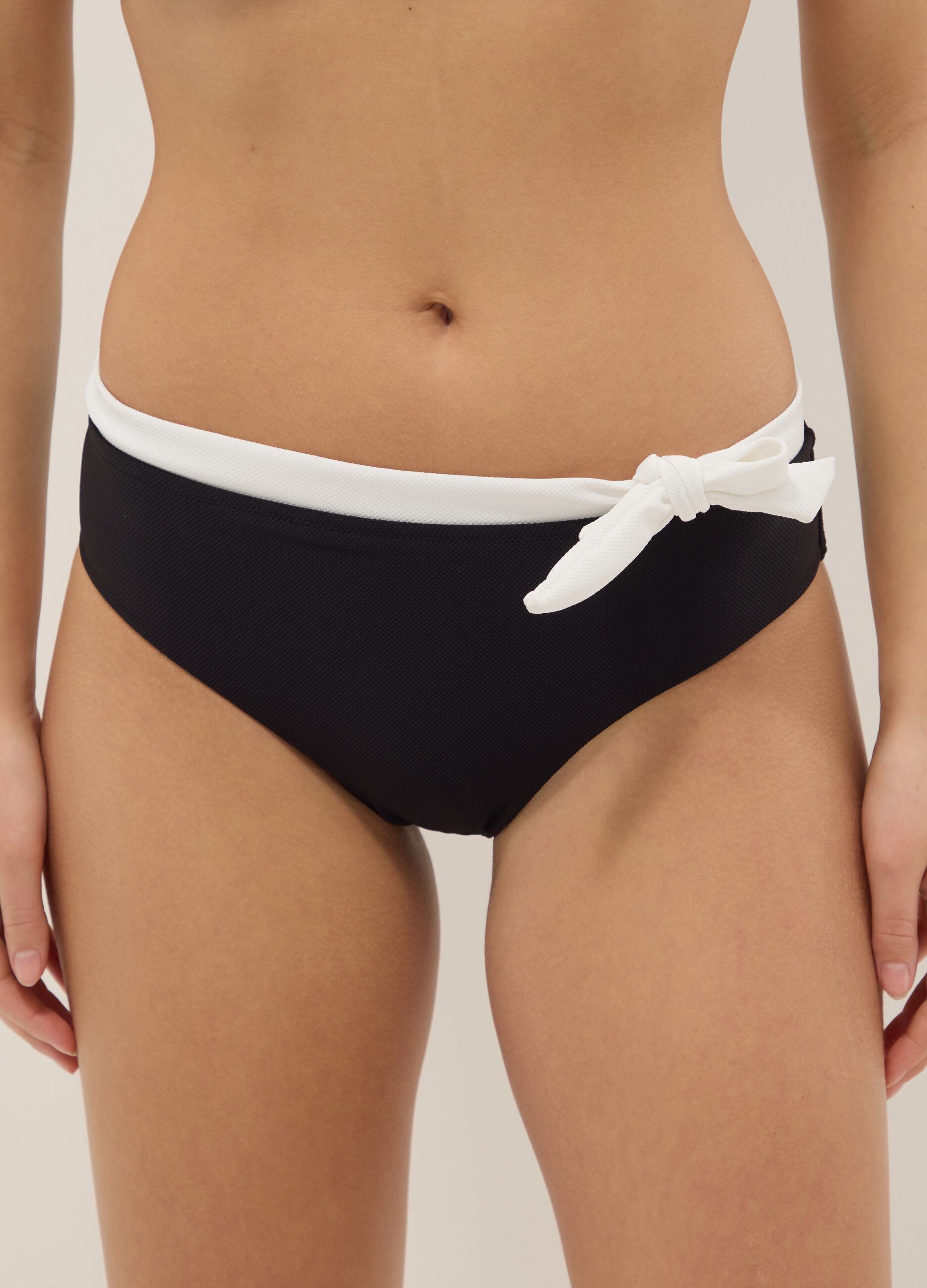 Black stretch bikini bottoms with white drawstring