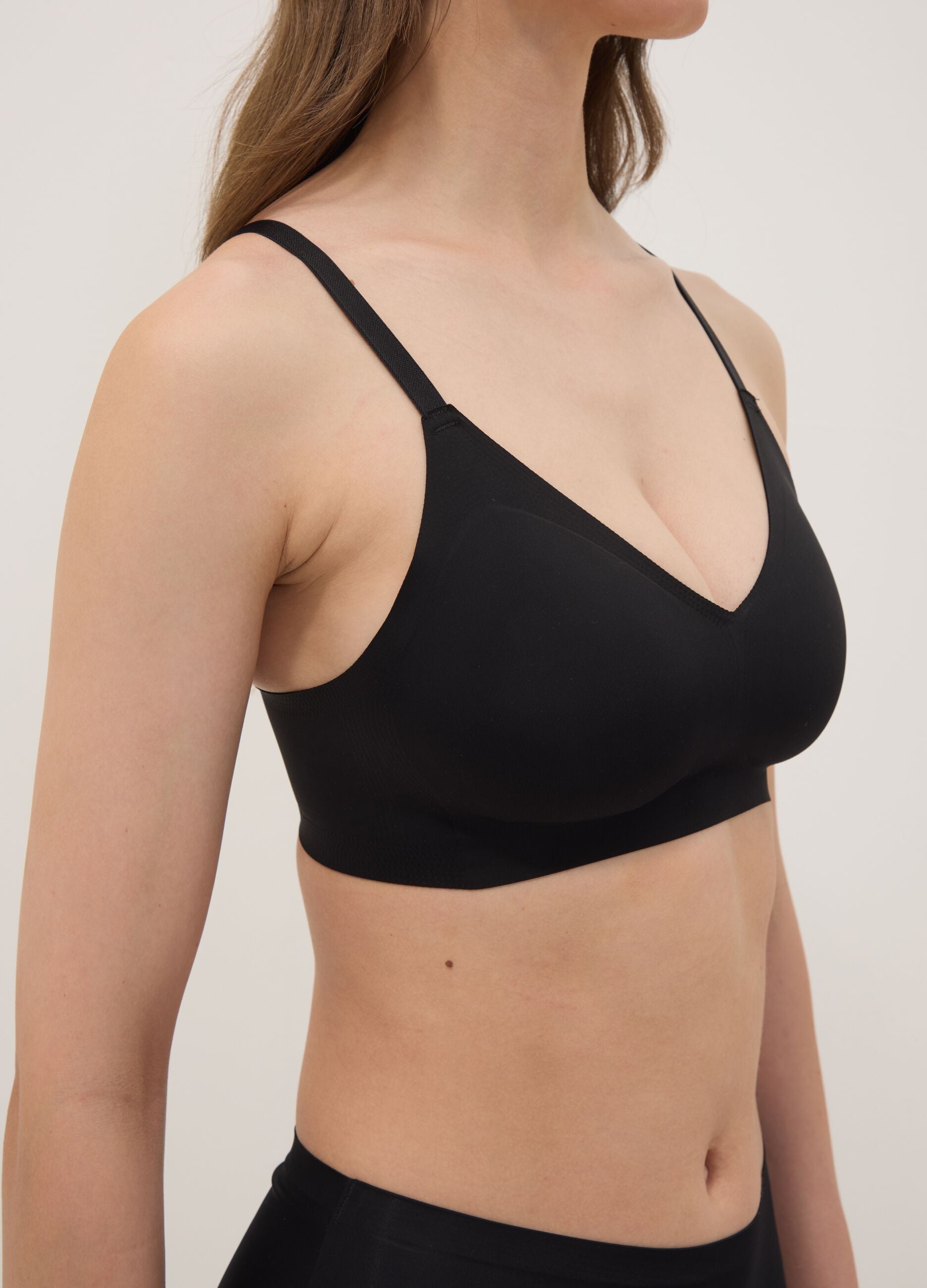 Black stretch-fabric bra with removable cups
