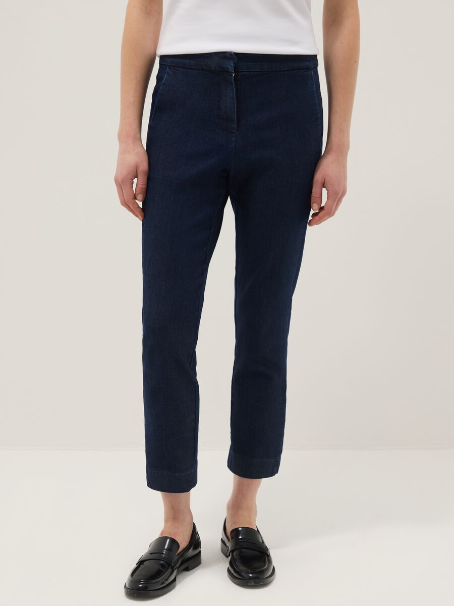 Blue slim fit stretch denim cotton blend trousers_1