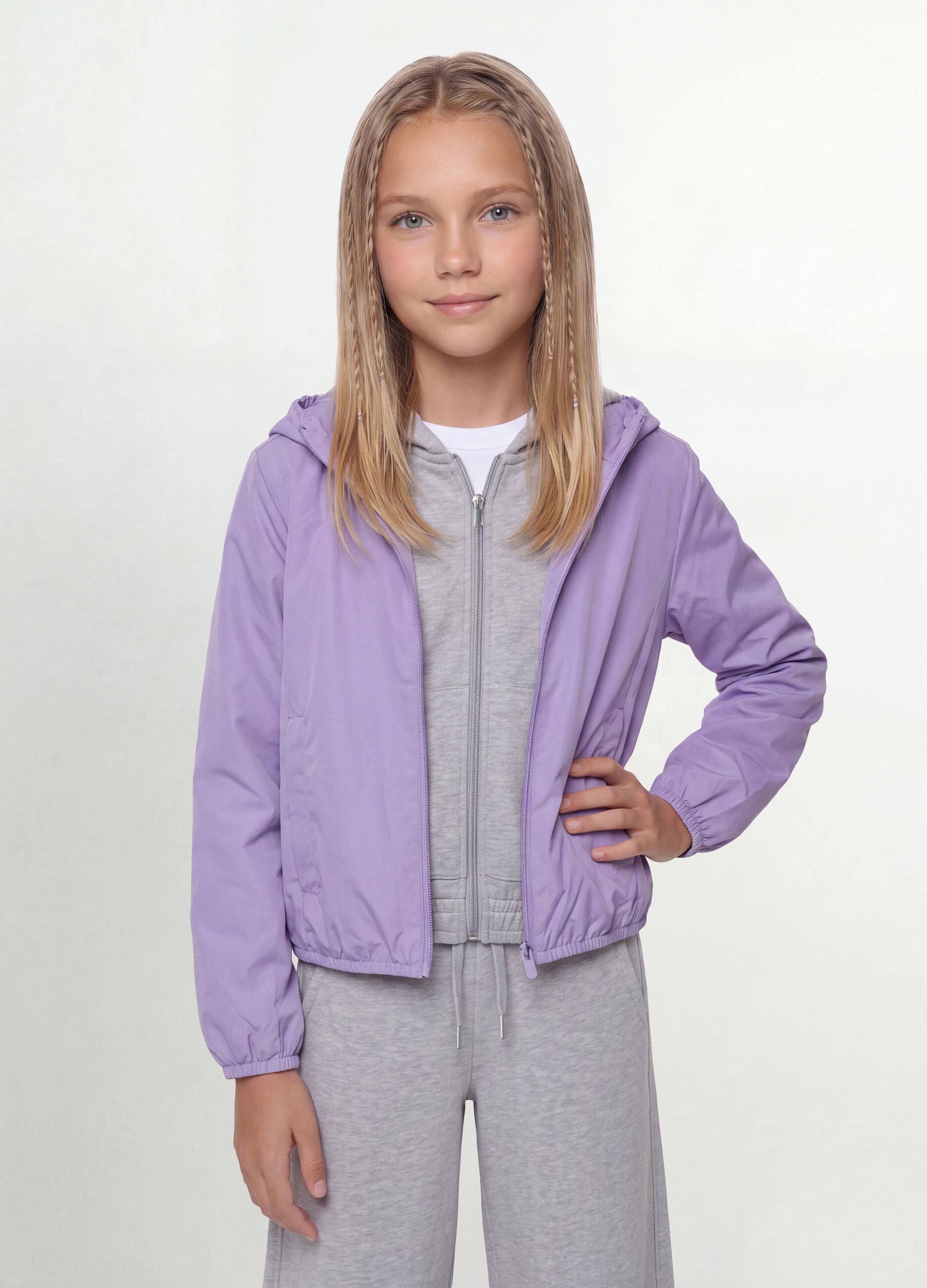 Purple rain jacket with hood and zip for girls