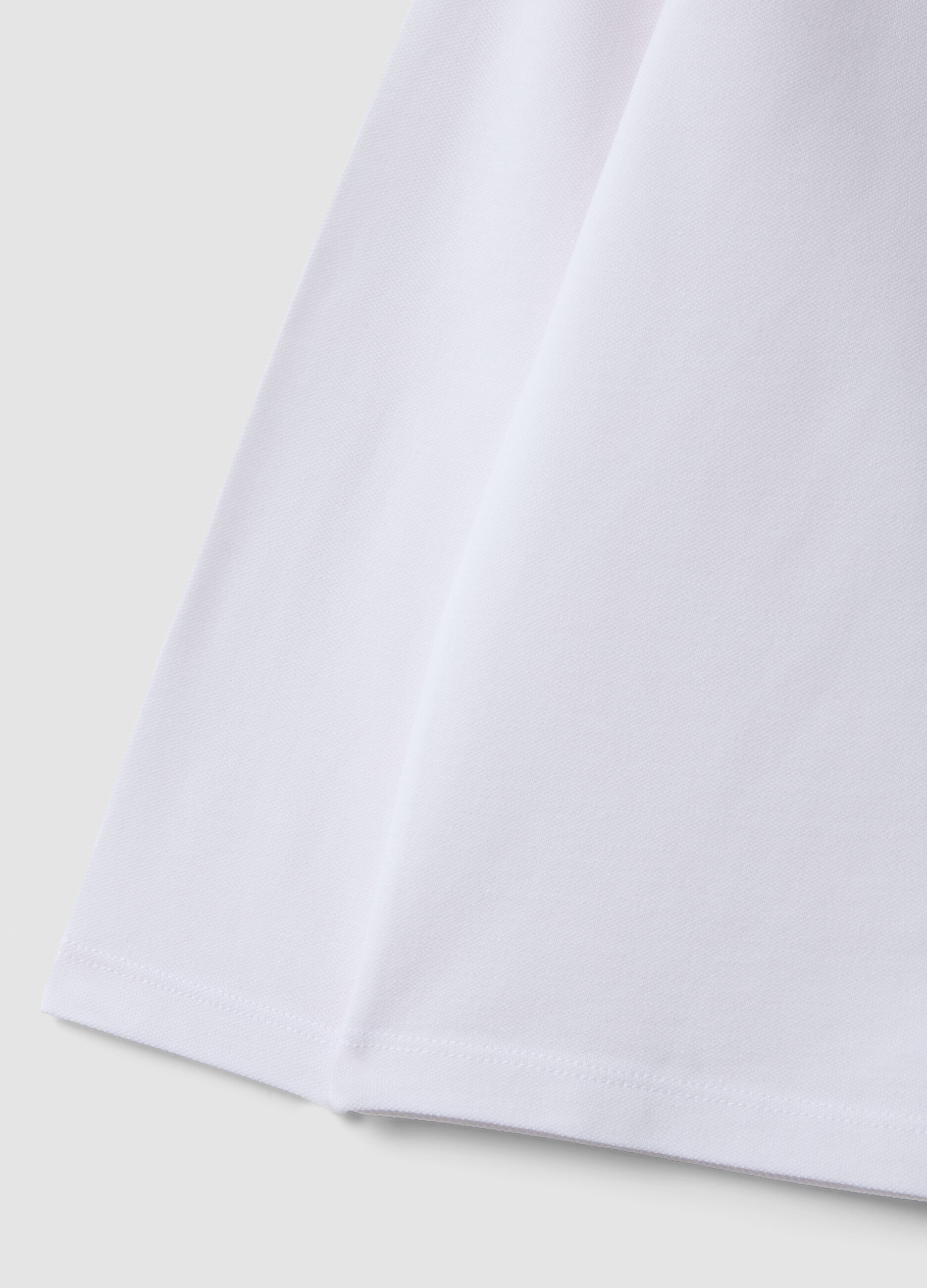 White long-sleeve polo shirt in pure organic cotton, regular fit, for boys
