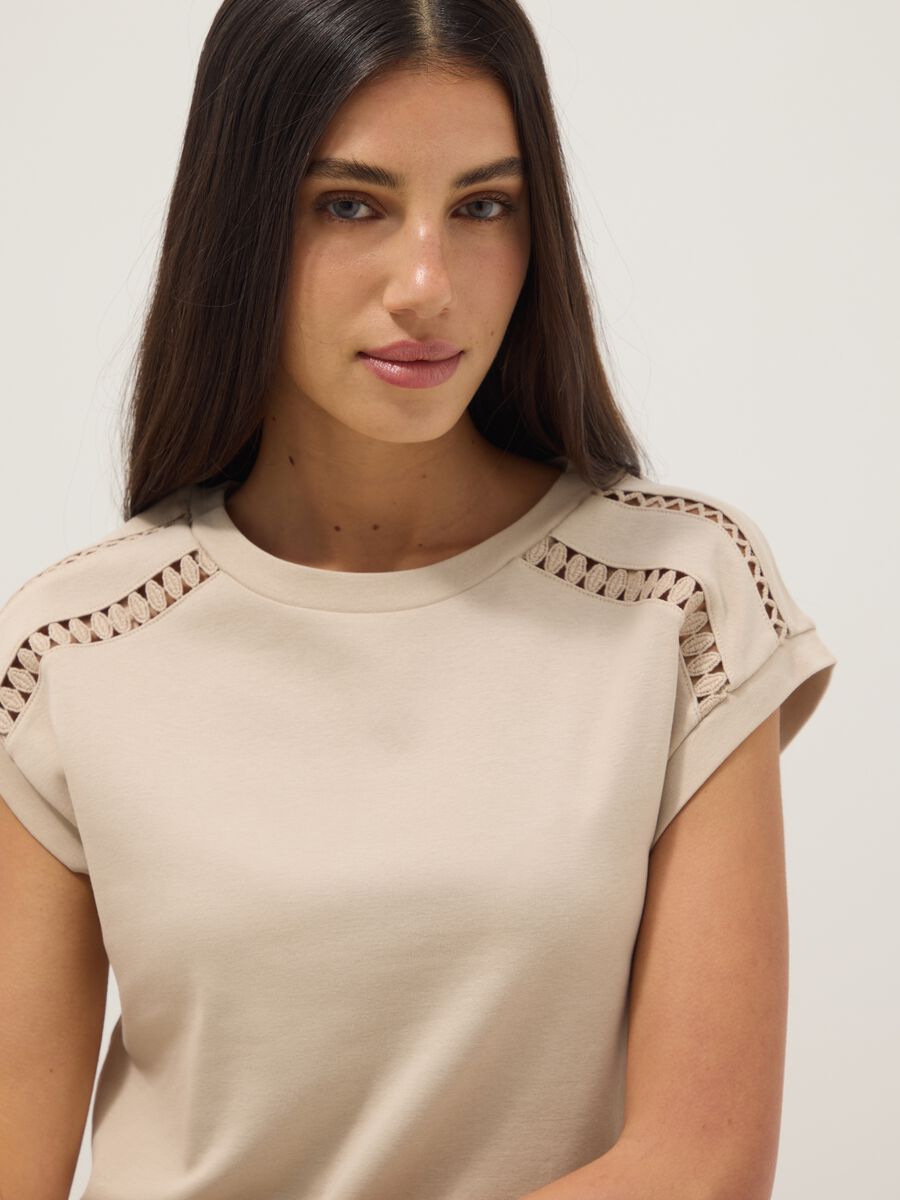 Beige pure cotton T-shirt with openwork inserts_0