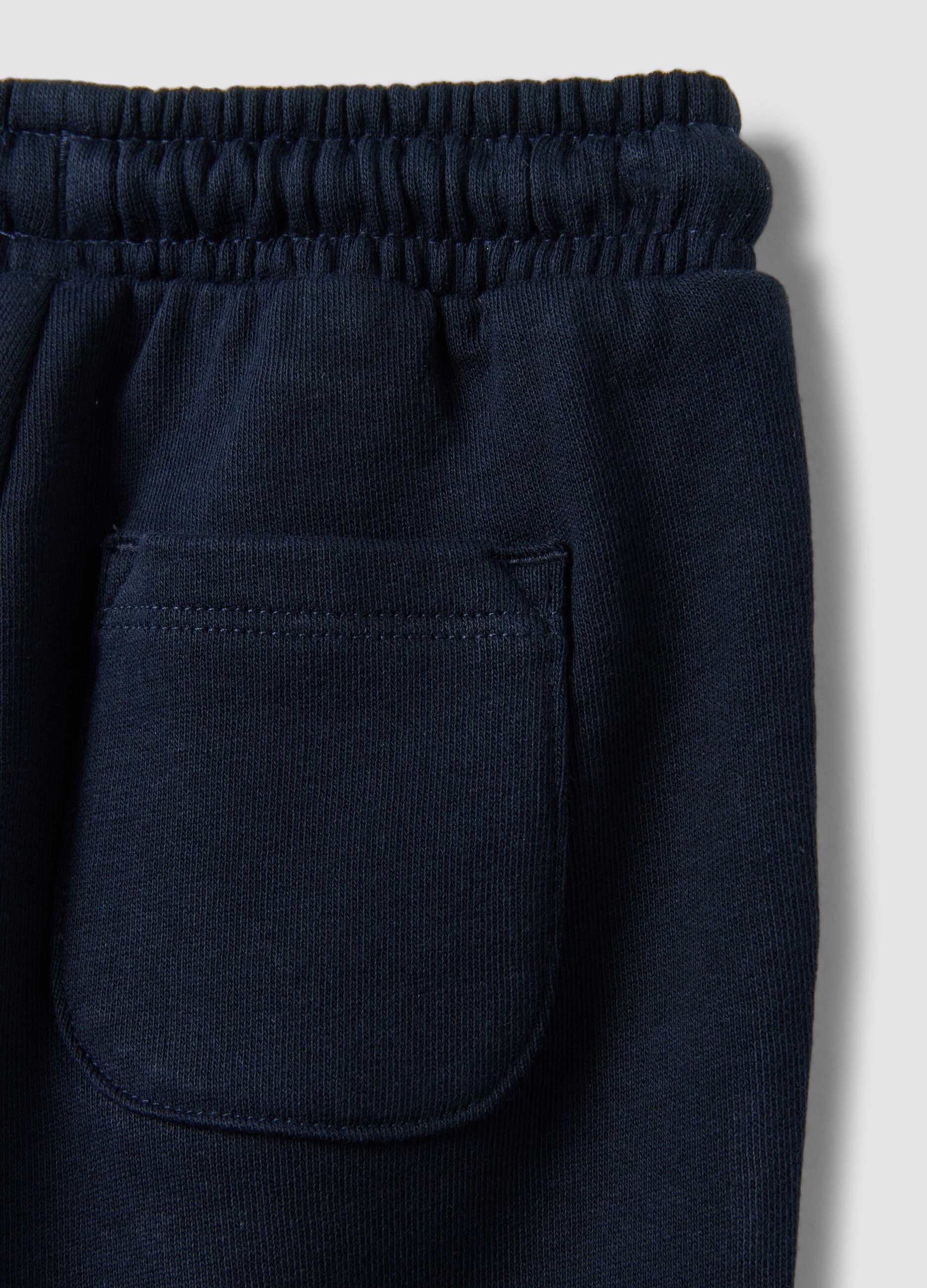 Blue jogger trousers in pure organic cotton with drawstring for baby boys
