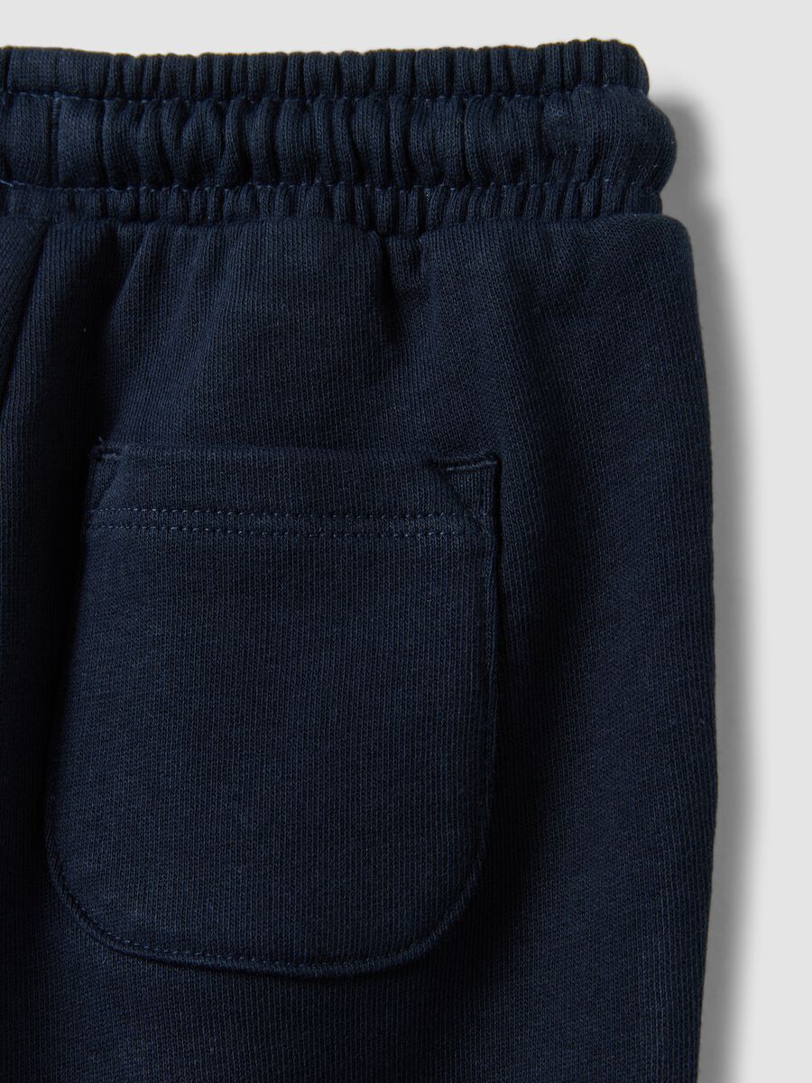 Blue jogger trousers in pure organic cotton with drawstring for baby boys_3