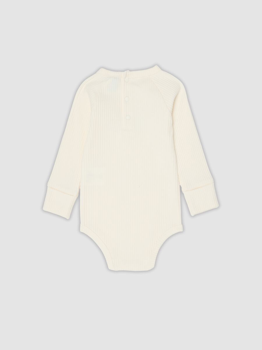 White ribbed organic cotton Disney 101 Dalmatians baby bodysuit_1
