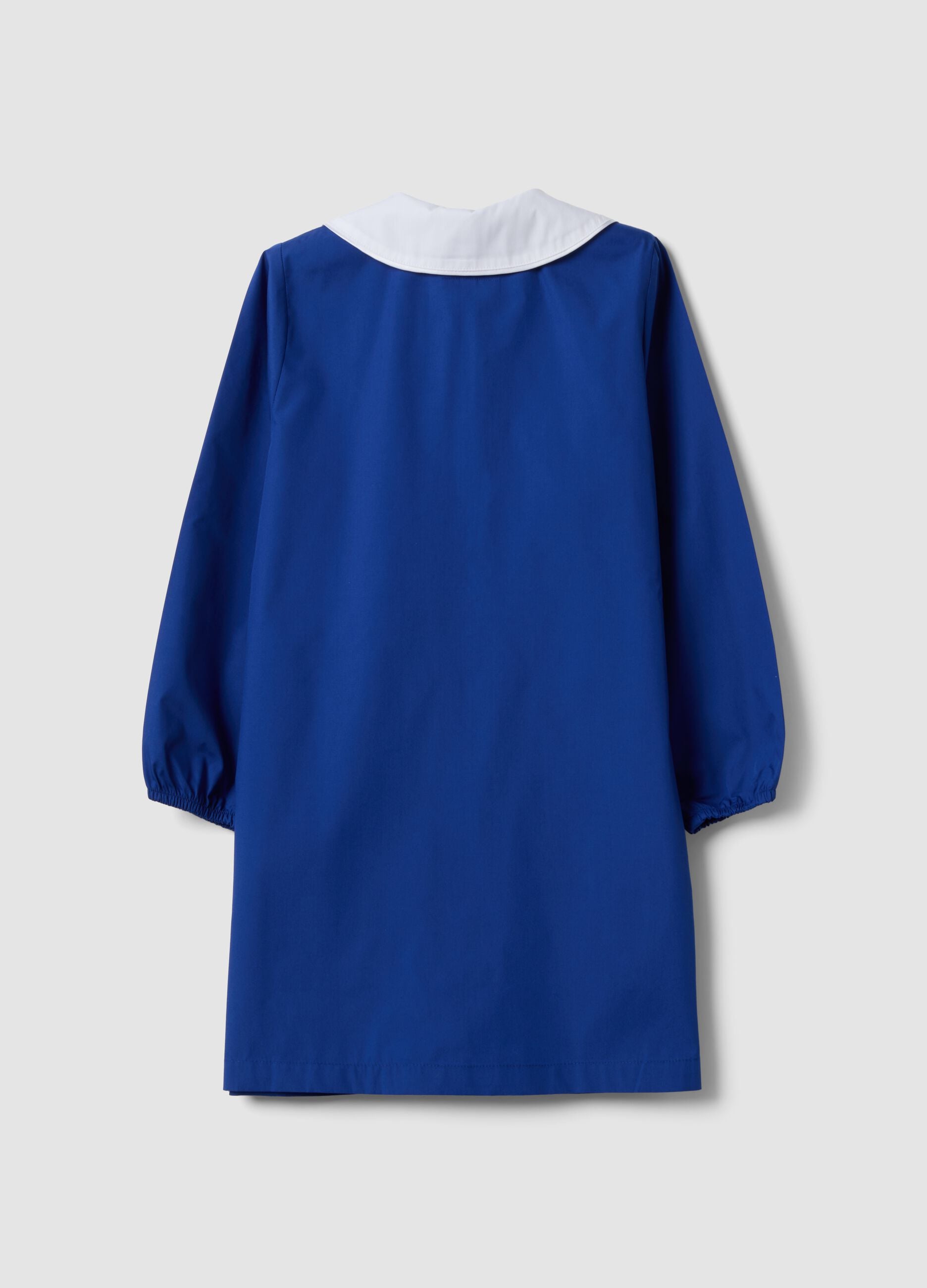 Customisable blue school apron with rhinestone details and floral embroidery