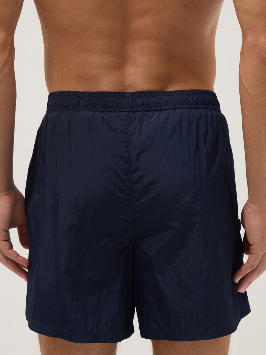Blue swim shorts with elasticated waistband_2